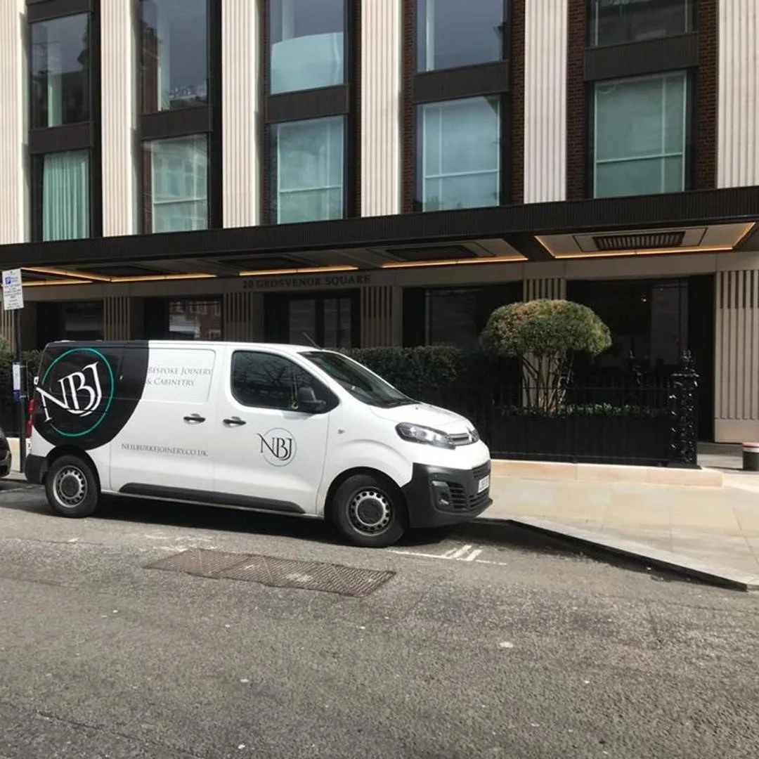 An image of an NBJ van and the Installation Team
