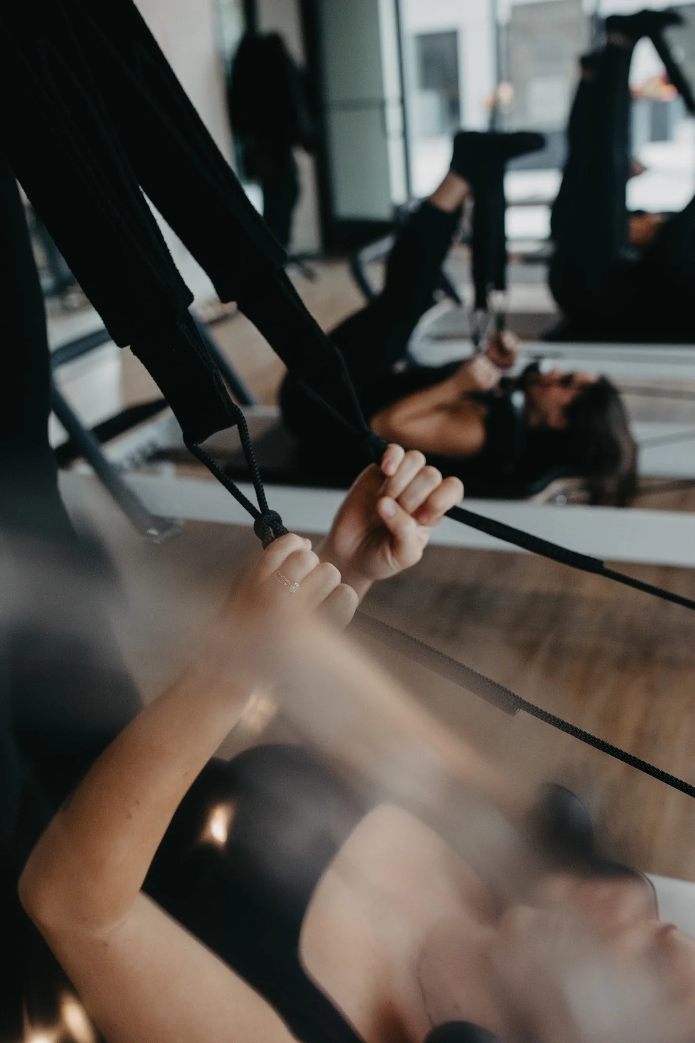 Restorative Pilates stretch on the Reformer.