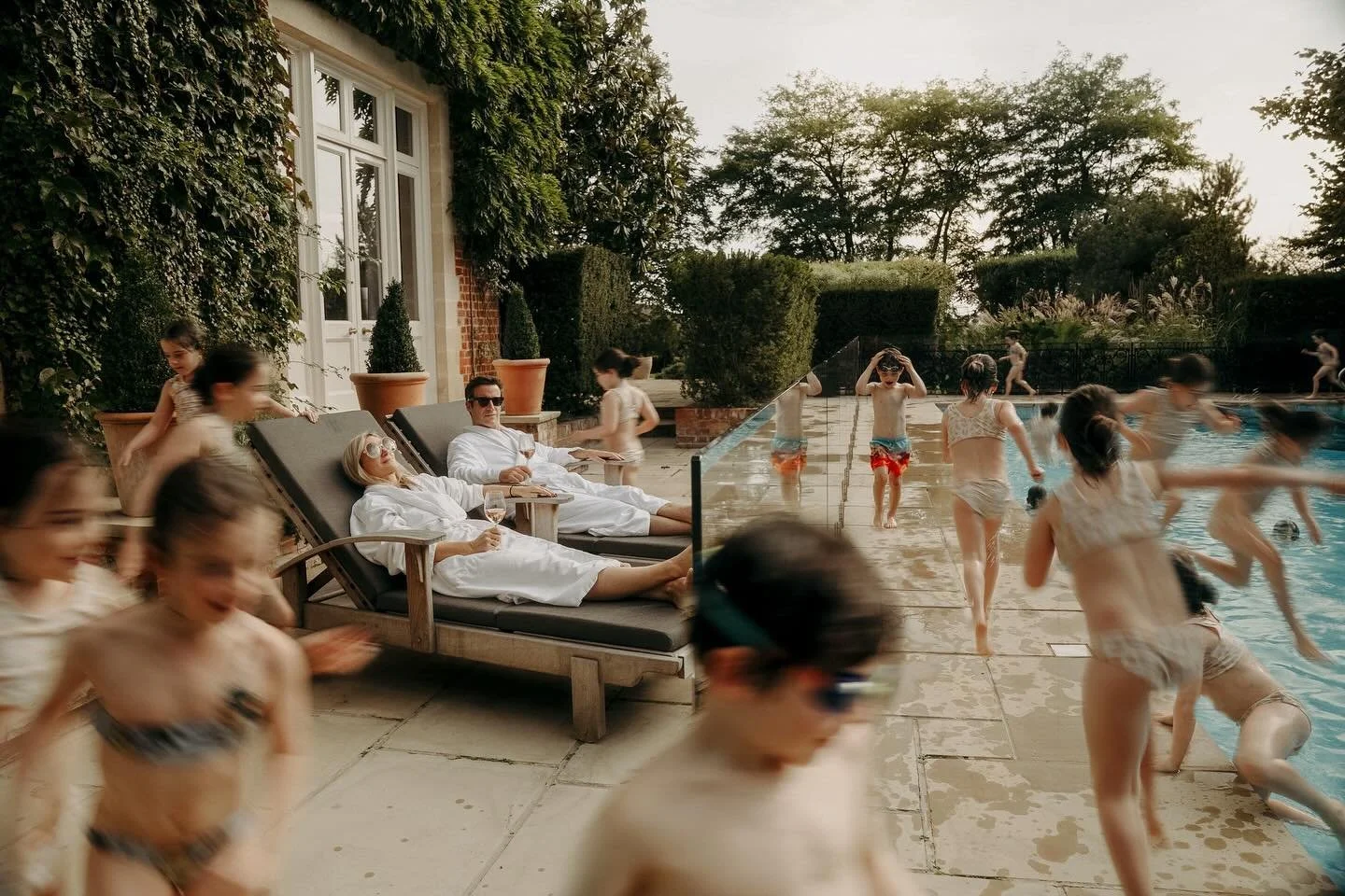 I wanted to capture a feeling with this image. We&rsquo;d spent the day taking photographs on the tennis court, the trampoline and in the woods. The adults, myself included, were definitely operating at a different speed to the three children. So thi