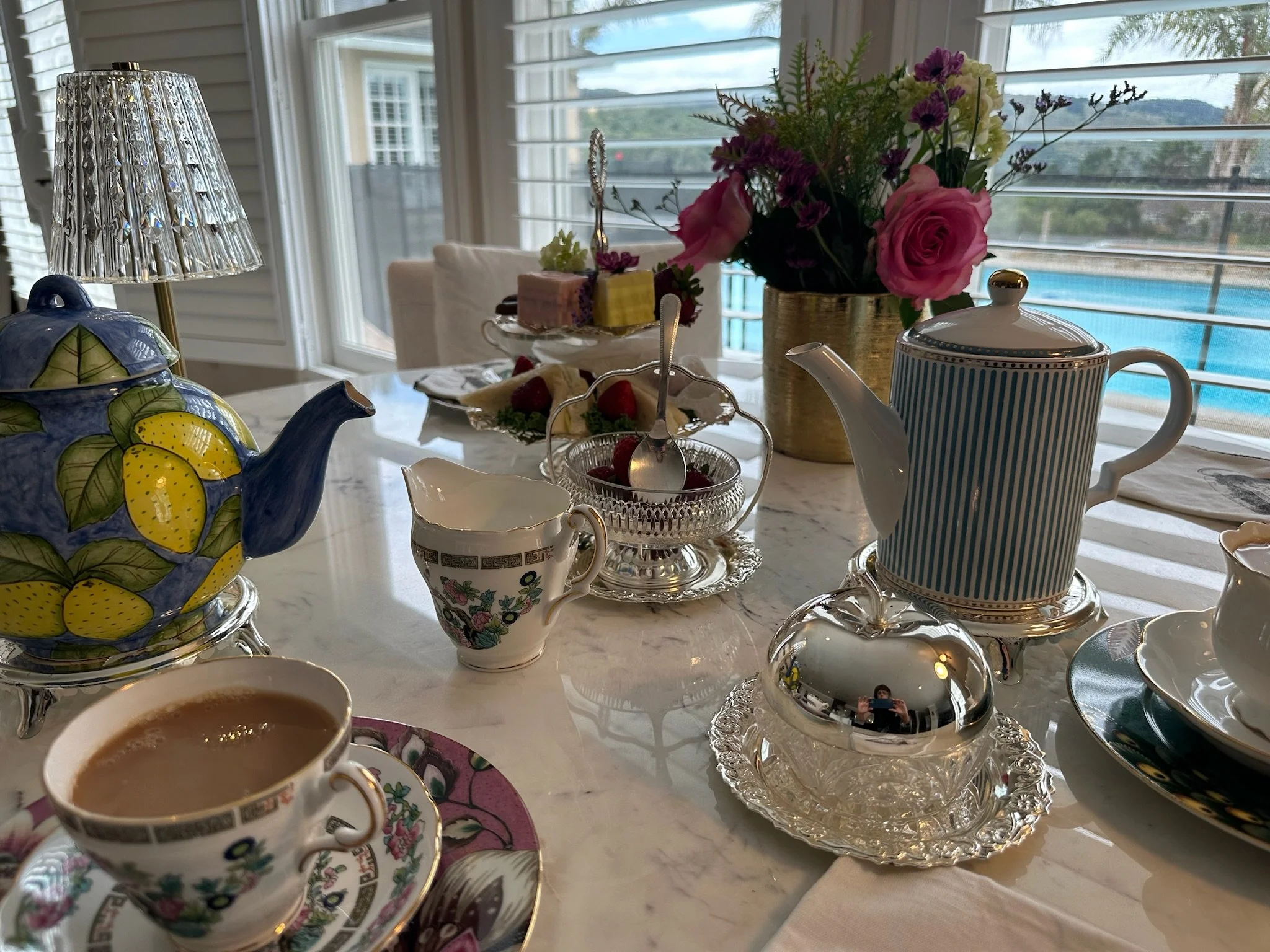 Fresh baked scones with homemade clotted cream at Monterey high tea experience