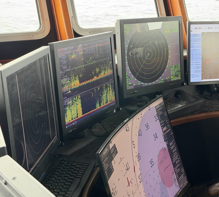 Sonar and navigation displays aboard the F/V Progress
