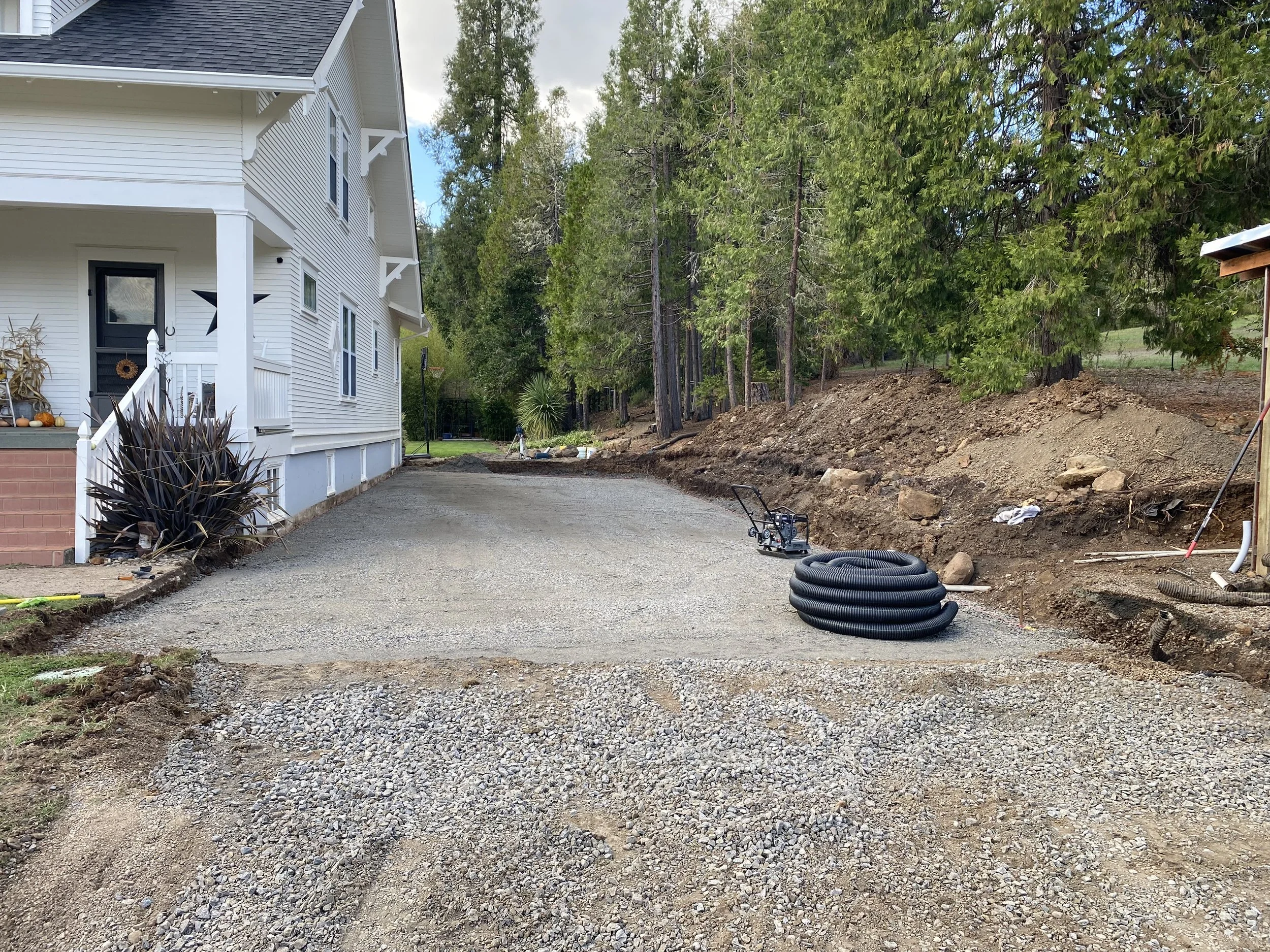 Base prepared and graded for proper installation of perforated drainage pipe.