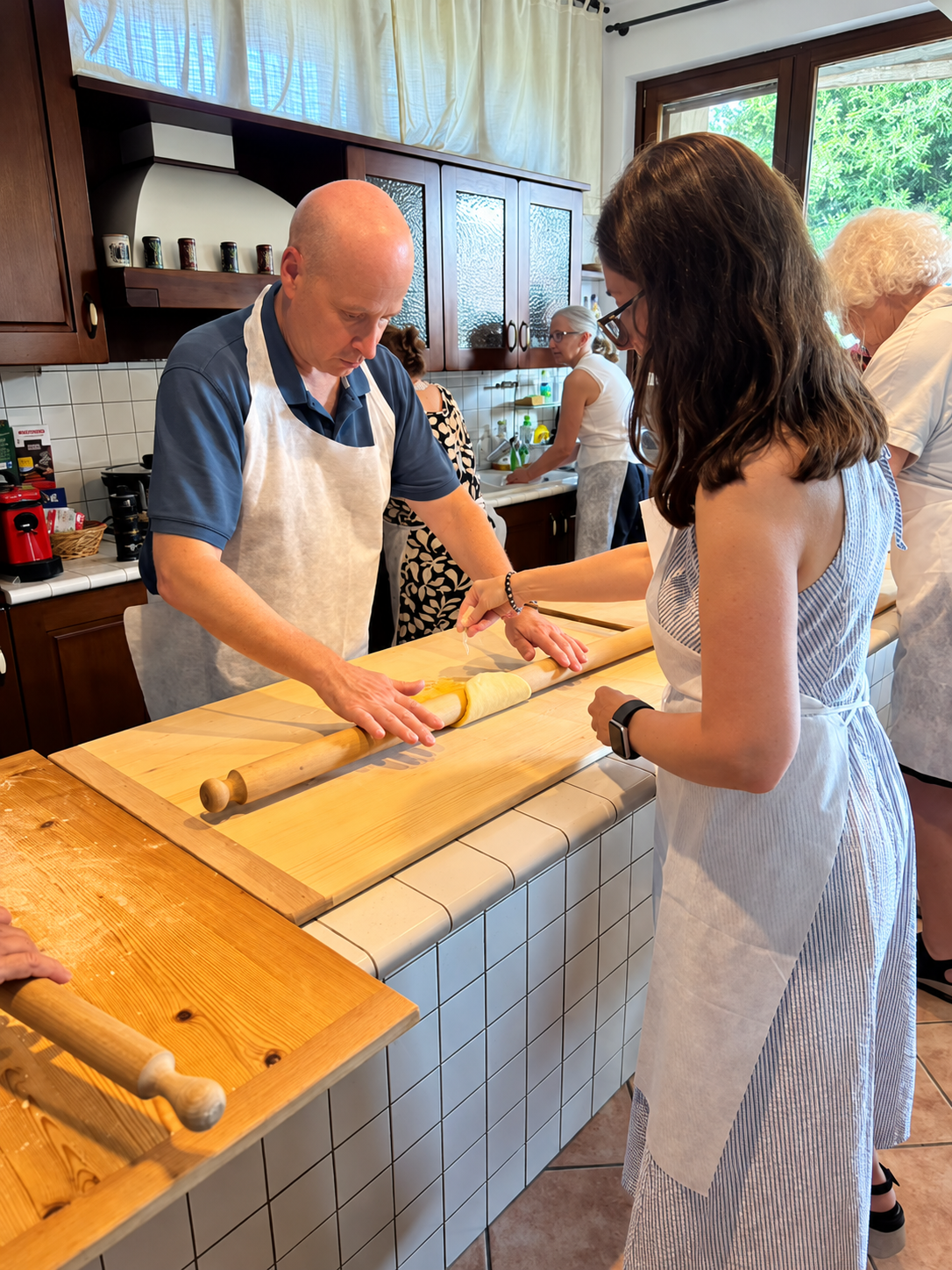 Baking together in a bustling kitchen.png