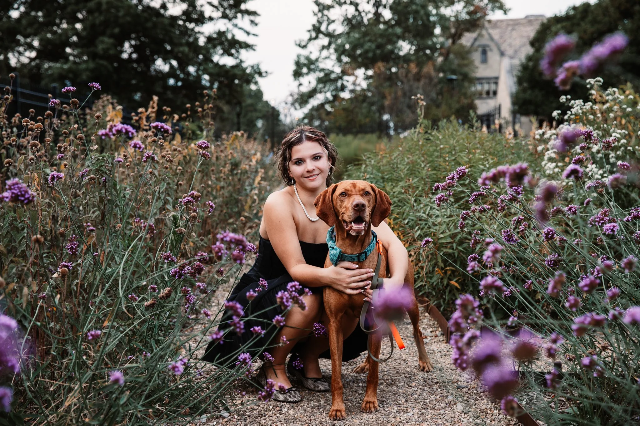 Senior photos in flower field at Hartwood Acres