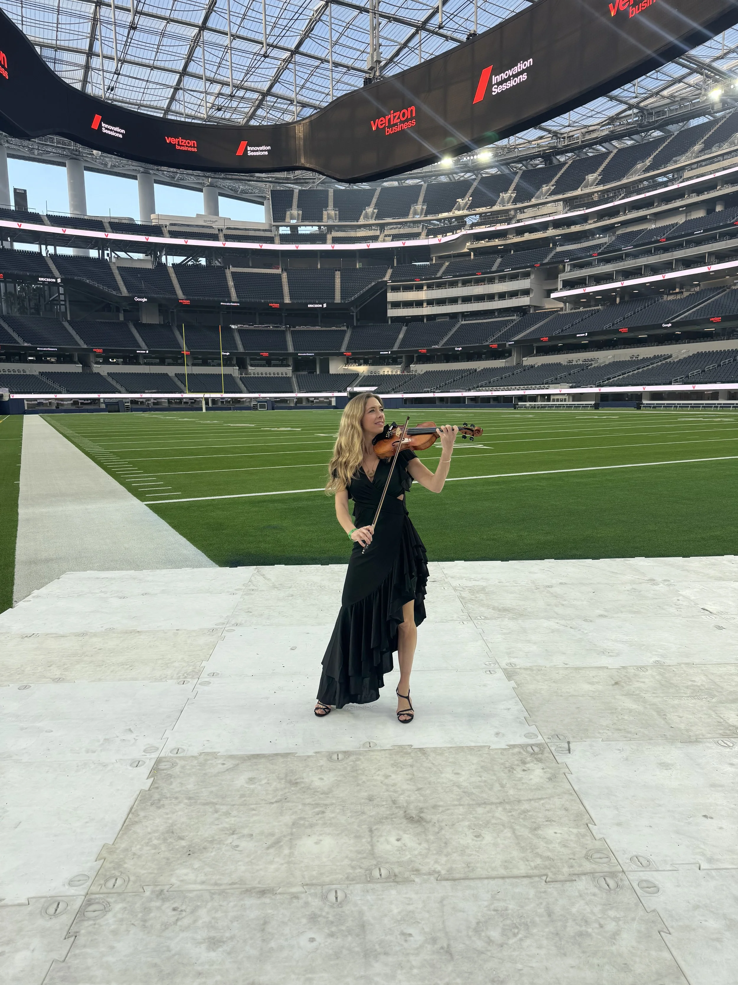 Elin Wolf performing live violin music at SoFi Stadium in Los Angeles