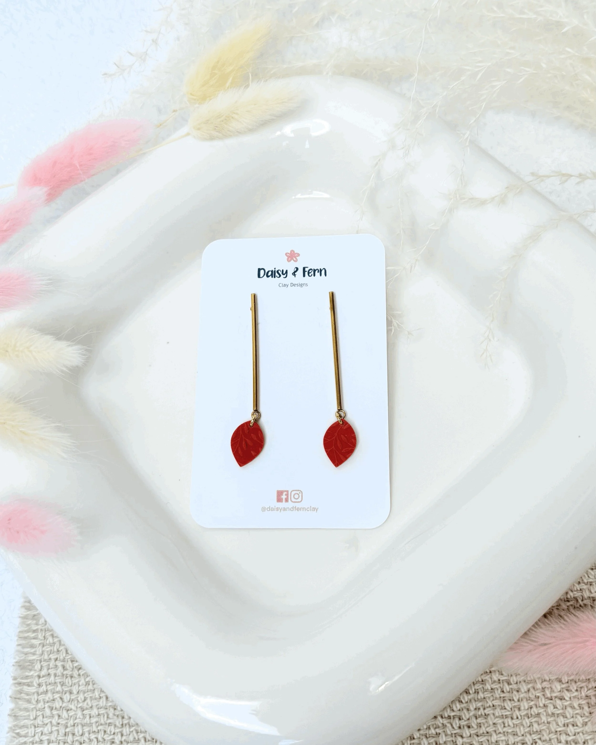 Honeycomb orange leaf texture on long gold bar stainless steel drop earring