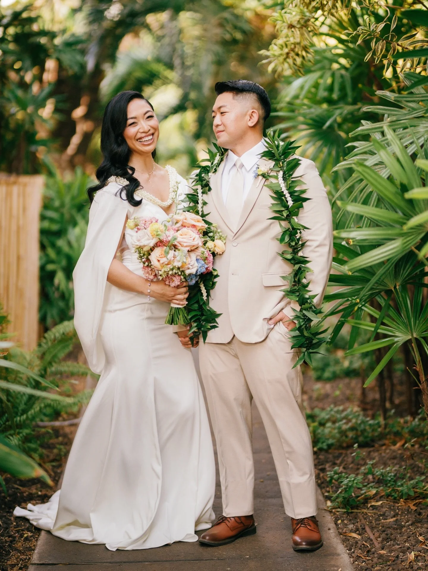 Glowing non-stop! 😍 Our gorgeous bride Cheynice &amp; Tyler tucked away in the lush landscape at one of our fav venues in Kihei: Sugar Beach Events. Still thinking of this day! 

Bridal babe @cheynice @cheynicephoto 
Beauty @lokahicollective 
Hair @