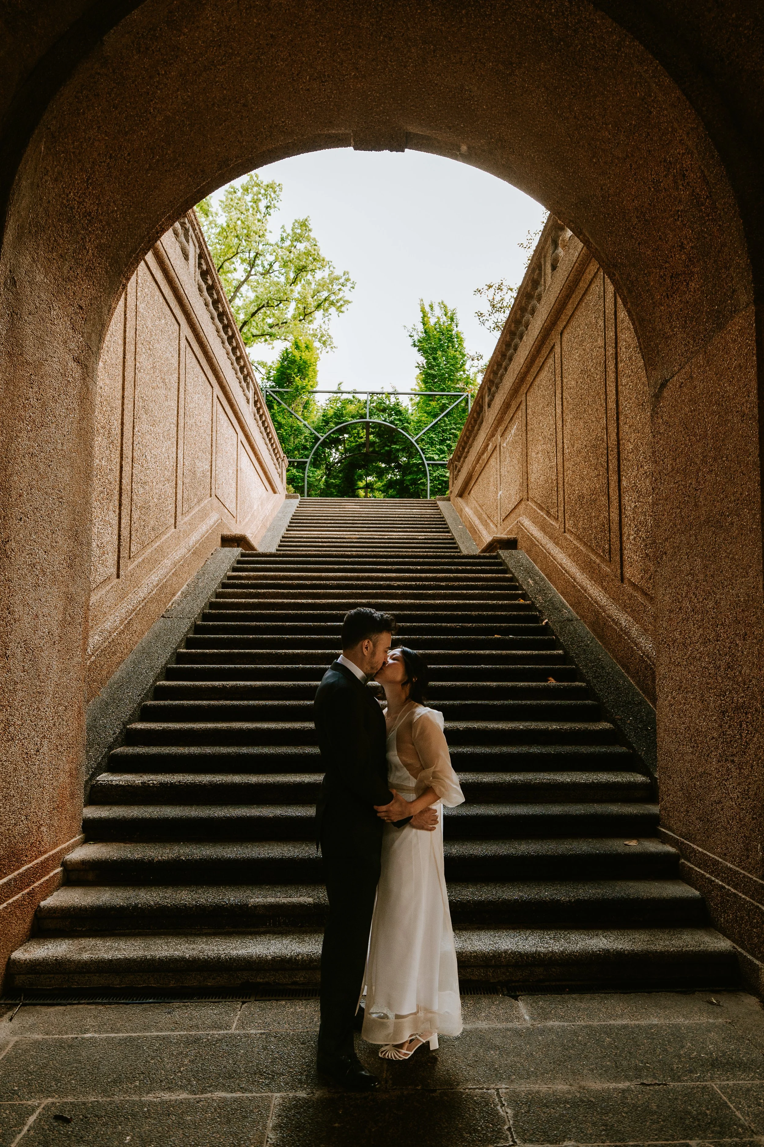 Couple under the staircase Arch at Meridian Hill Malcolm X Park