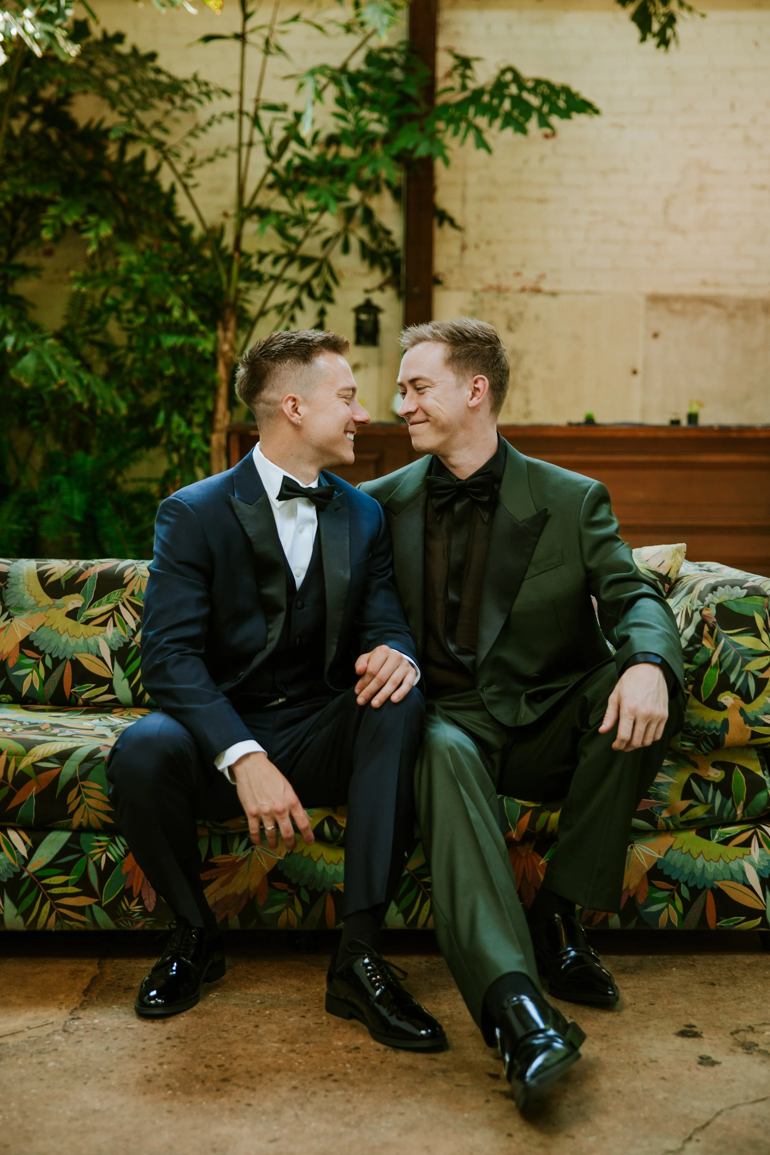 Grooms sitting looking at each other  at Millwick by Marvimon in DTLA
