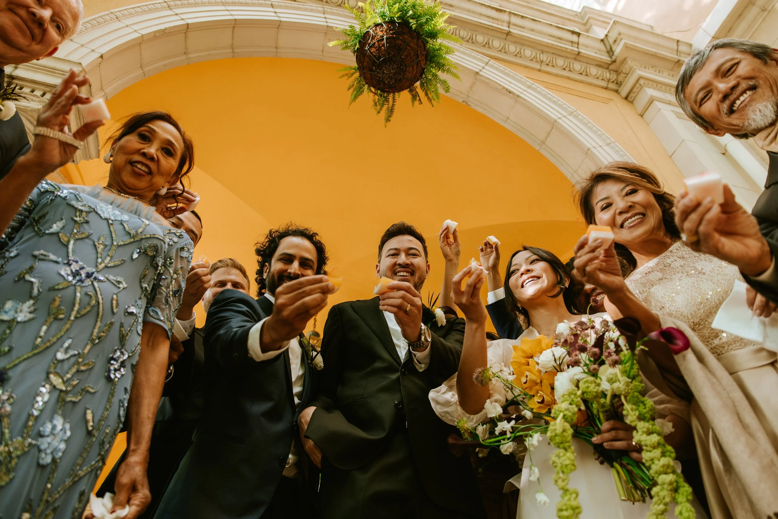 Post wedding ceremony group cheers at Josephine Butler Parks Center