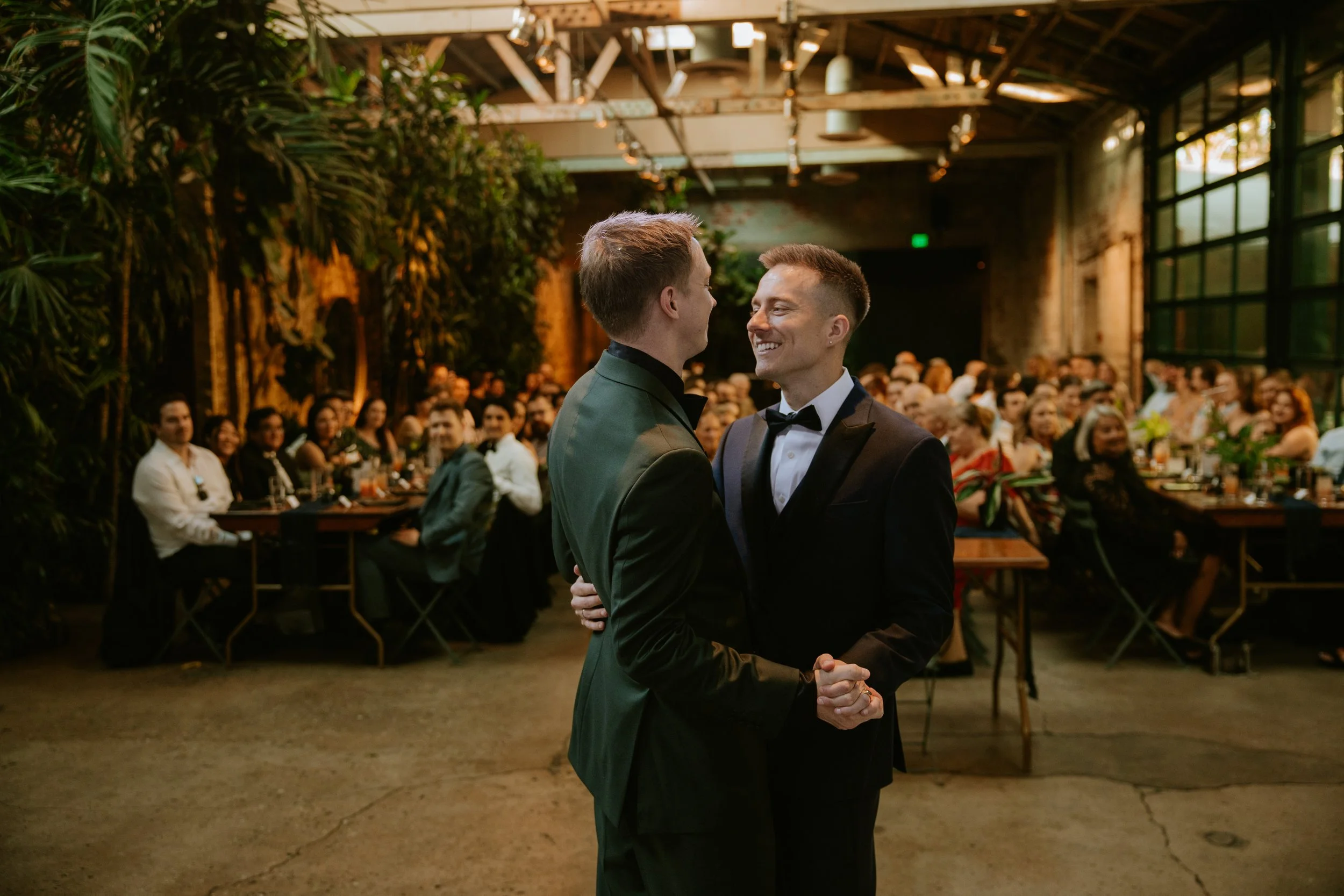 Grooms staring into each others eyes