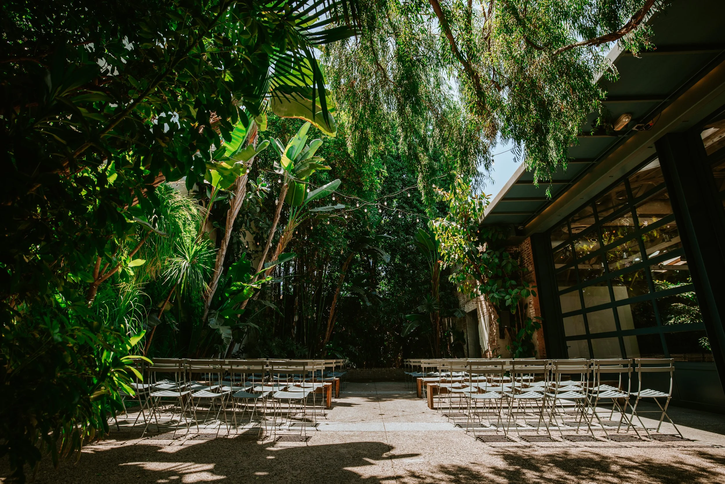 Green lush outdoor ceremony space at Millwick by Marvimon in DTLA