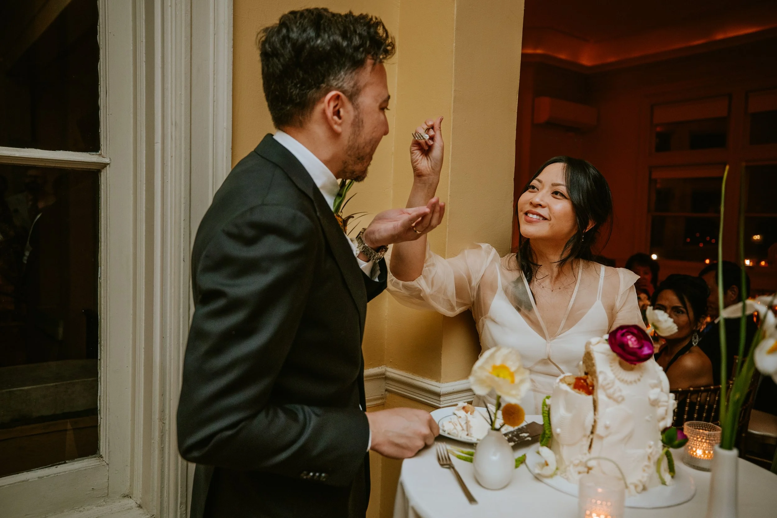 Newly wed couple cutting the cake at Josephine Butler Parks Center