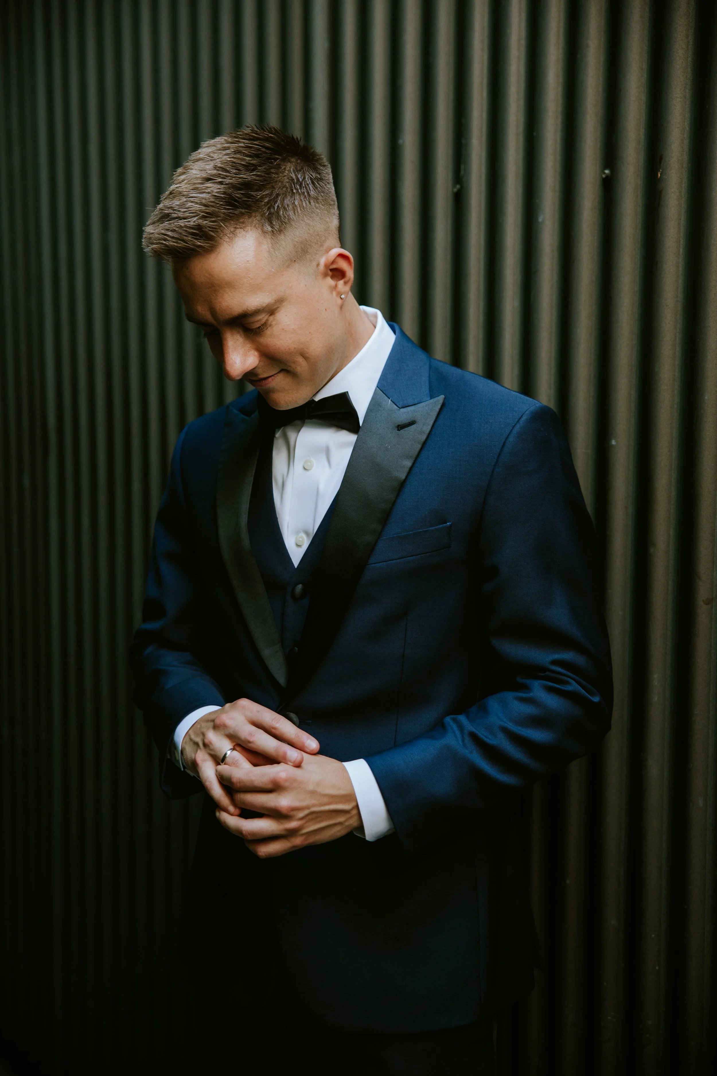 Groom looking at his engagement ring at Millwick by Marvimon in DTLA