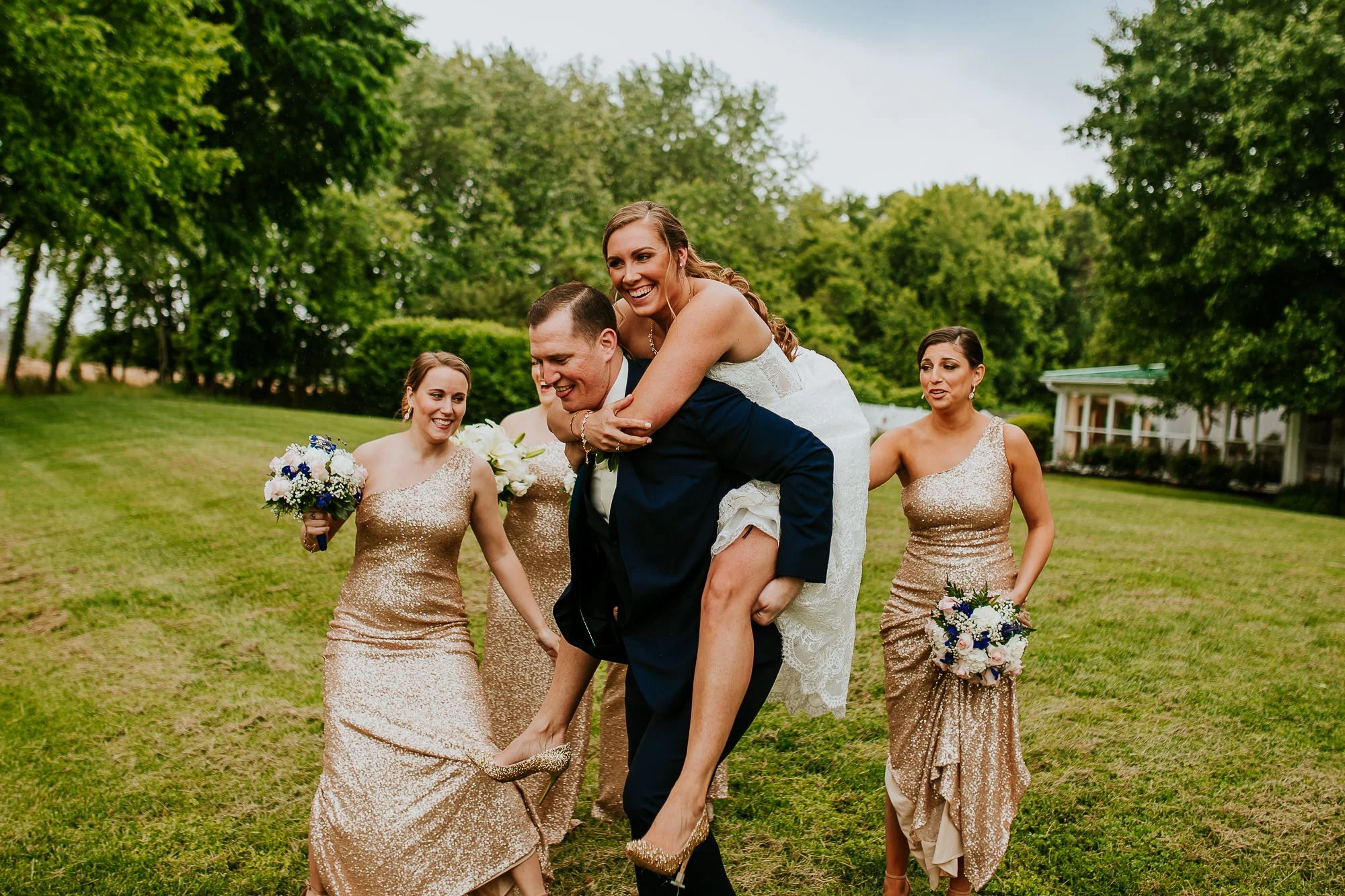 Wedding couple running through the field in Loudon, Virginia. Photo by Alex Lee Photography, Wedding Photographer