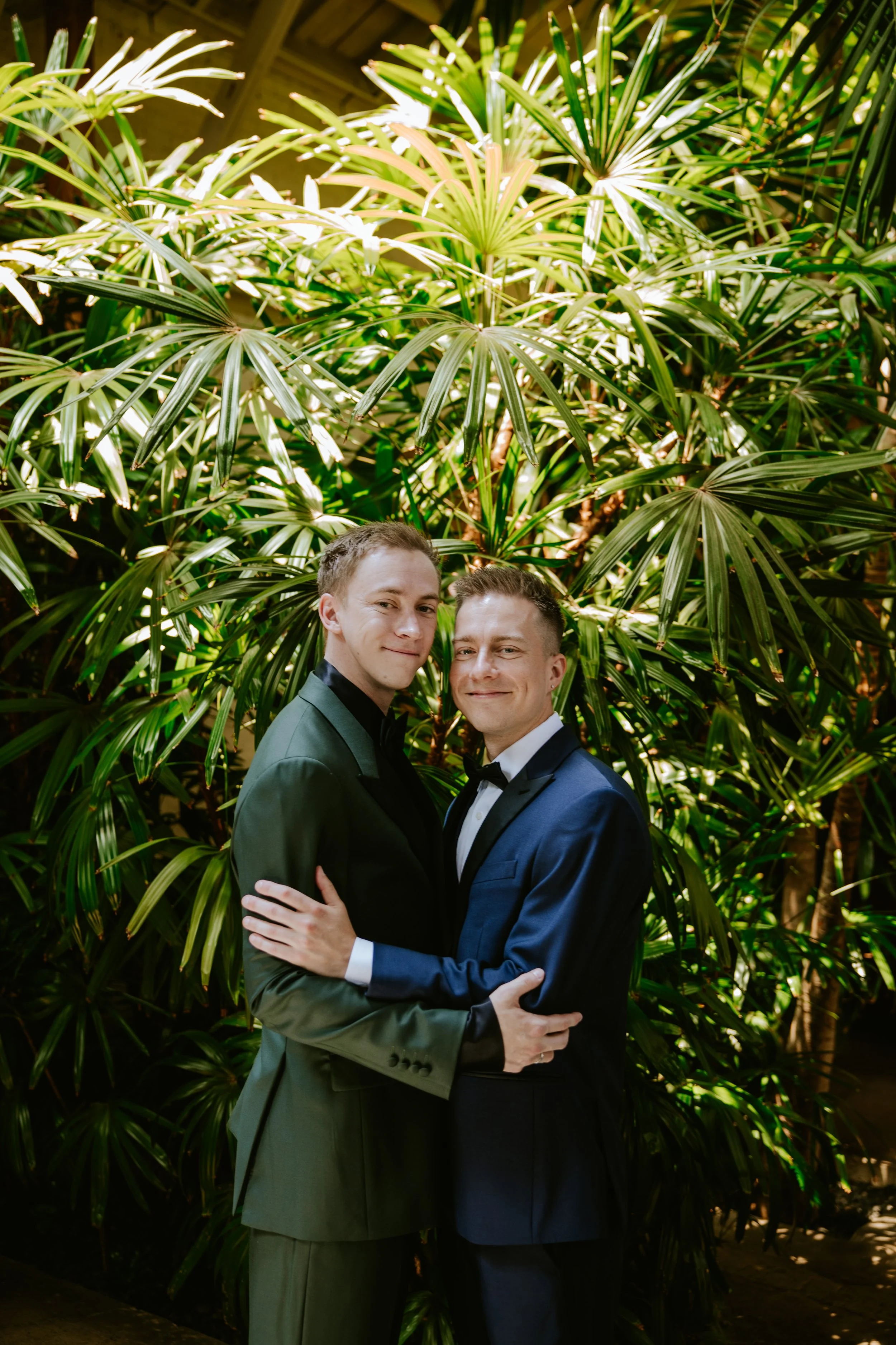 Grooms posing for a photo at Millwick by Marvimon in DTLA