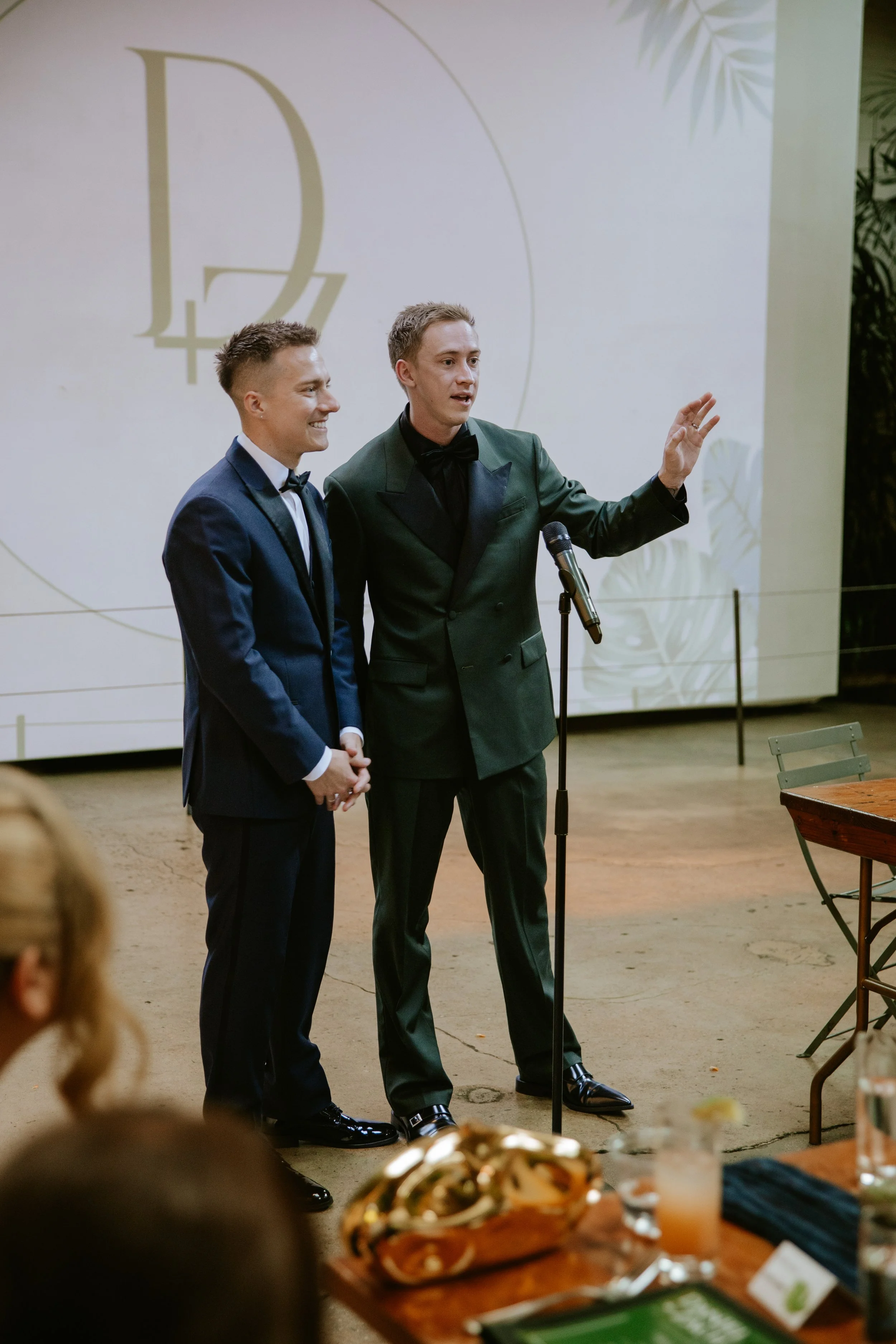 Wedding couple toast their families and guests