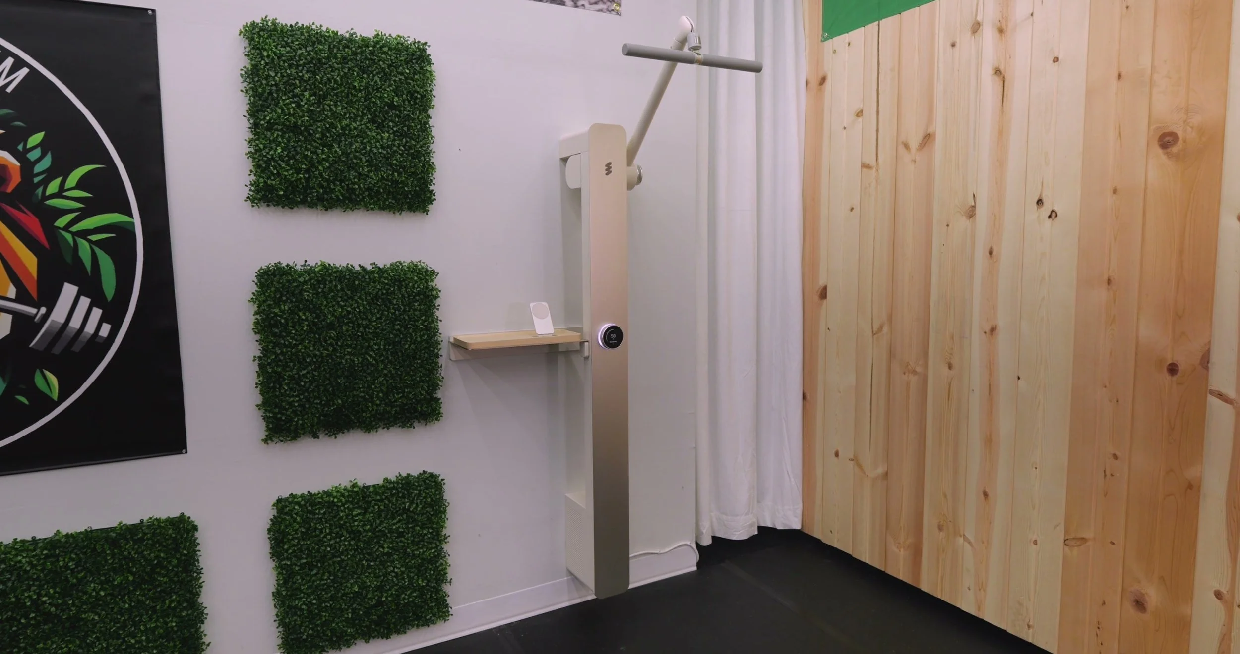 AMP Fit AMP Device wall-mounted smart cable system installed in home gym