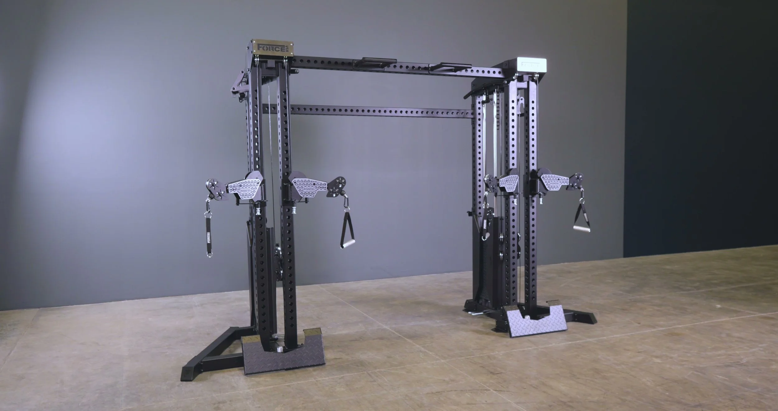 Force USA Tandem Tower single-stack cable tower with dual articulating arms