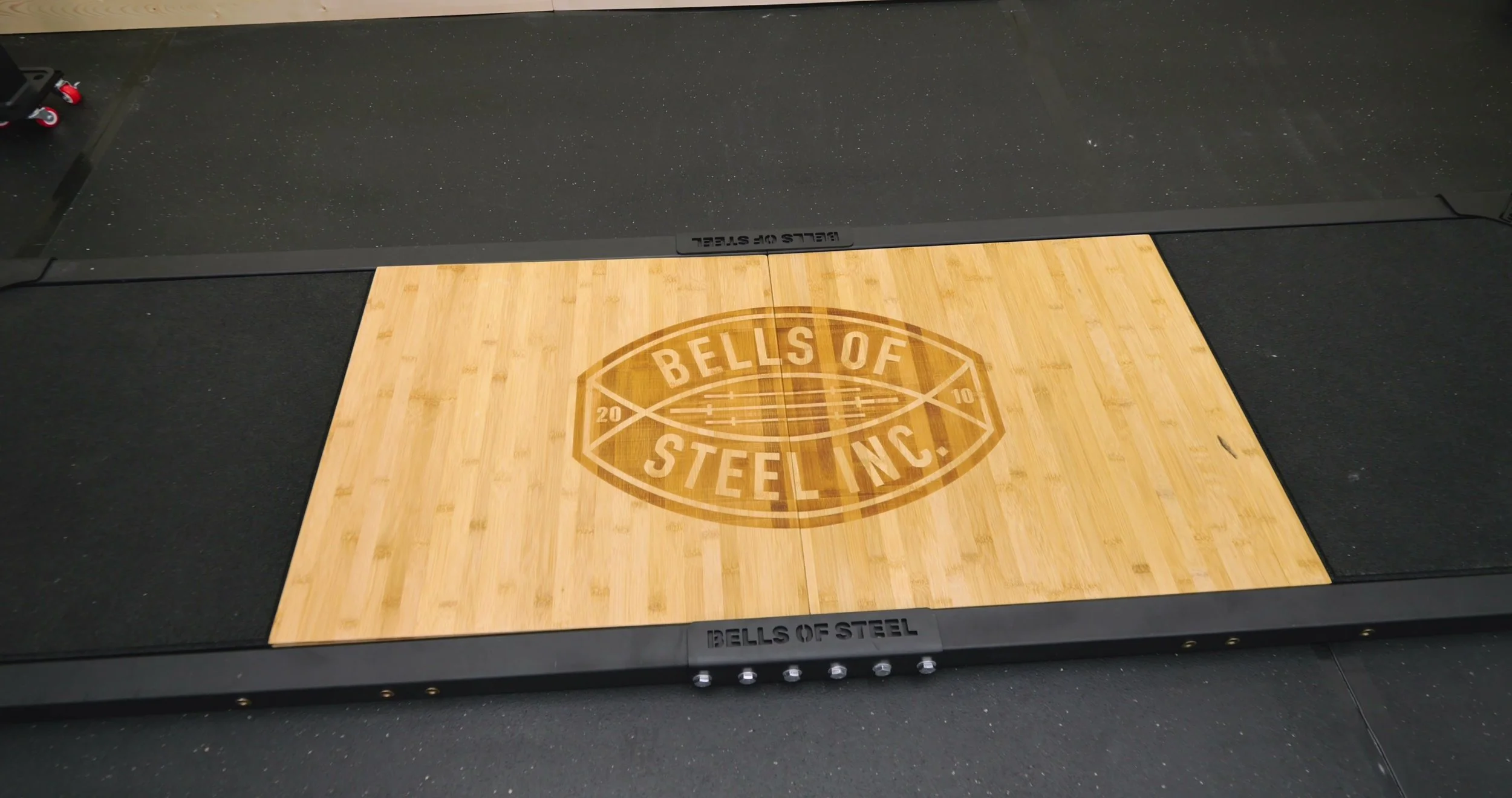 bamboo center tiles on bells of steel lifting platform