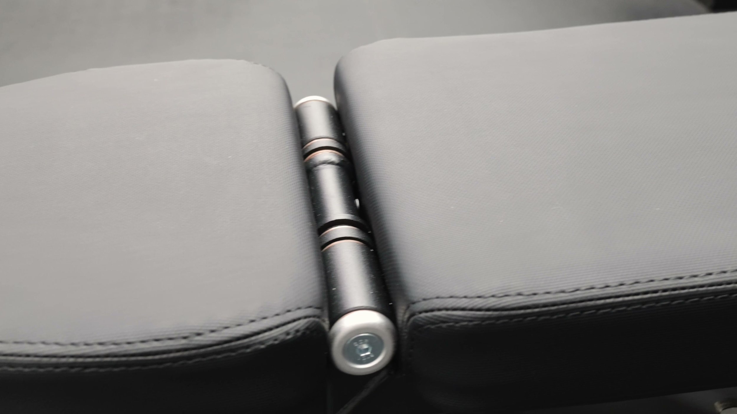 close-up of grippy dimpled vinyl bench pad showing texture and firmness