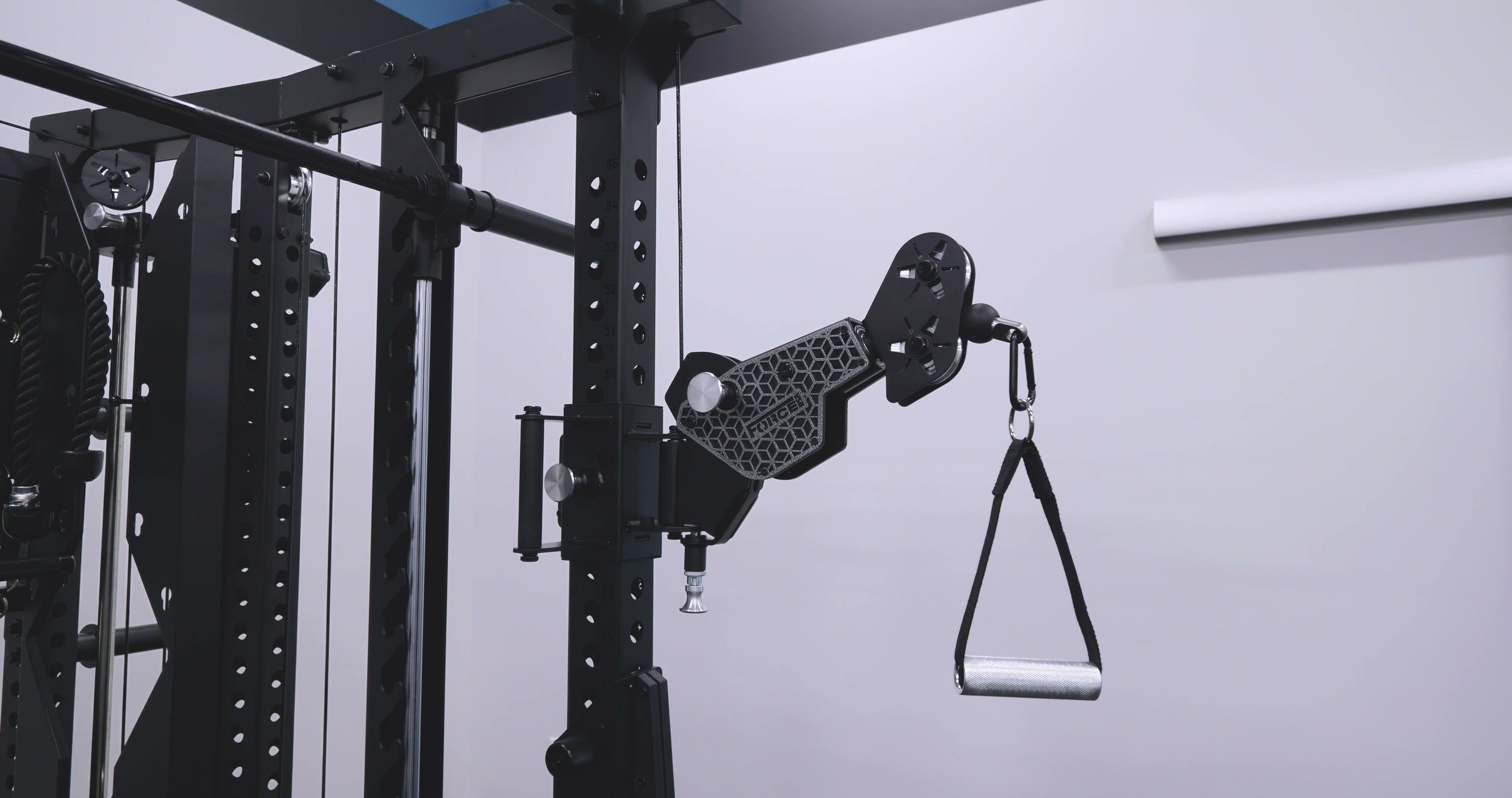 Force USA C20 articulating arms showing in-out and height adjustment points