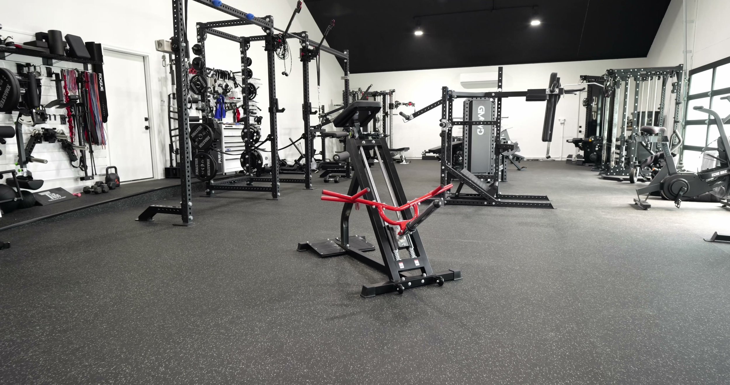 Mikolo S7 T-Bar Linear Row Machine set up in a home gym