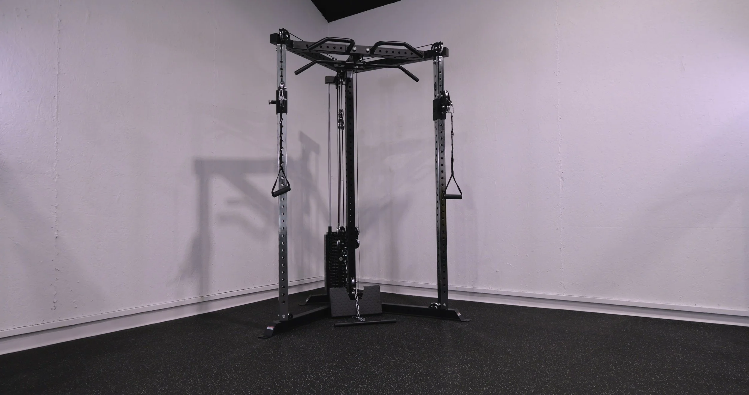 Bells of Steel All-in-One Trainer configured with its cable pulleys and center weight stack