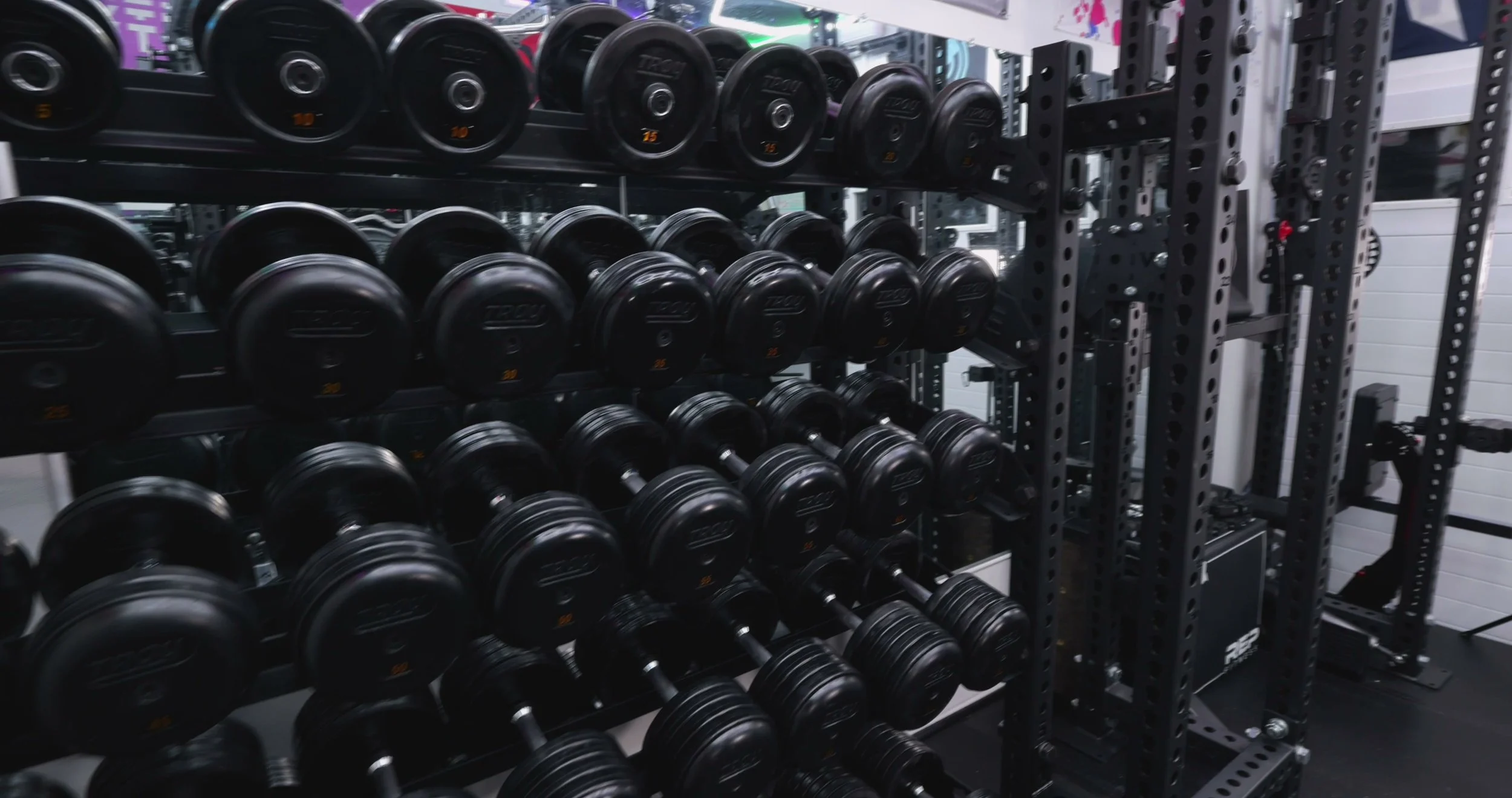 side view showing compact depth of dumbbell rack
