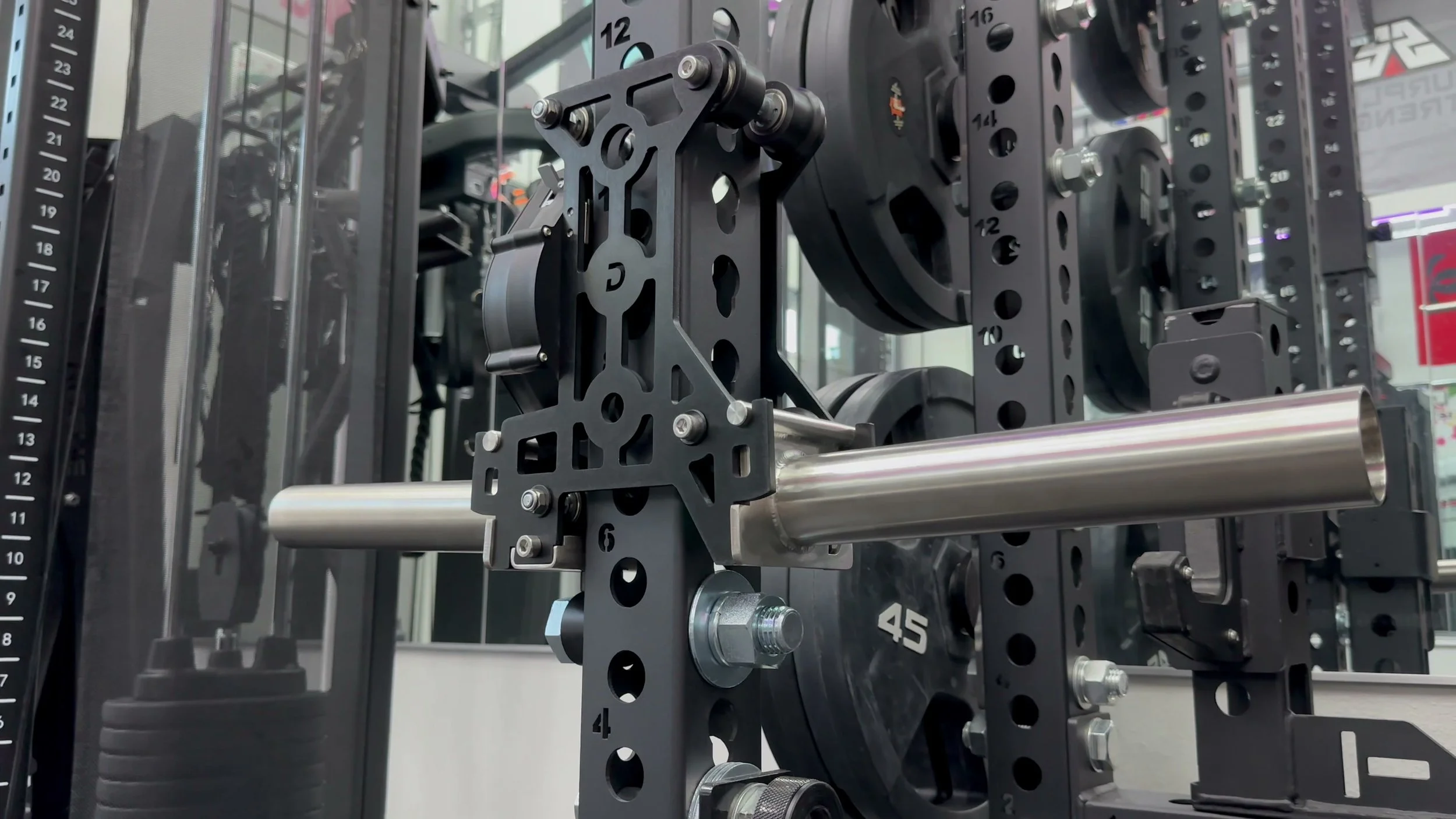 dialed motion ibex trolley mounted on 3x3 rack with loaded plates and handle attached