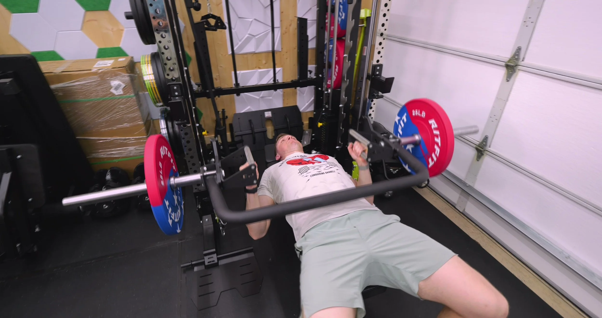 The REP Open Trap Bar racked in a power rack for safety squats