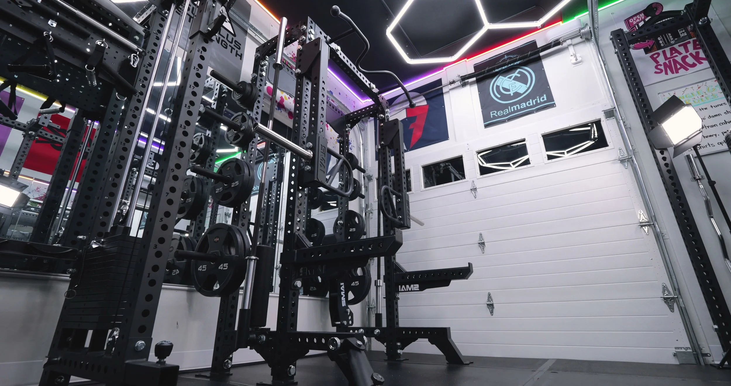 SMAI Vanta Series Half Rack fully built with attachments in gym
