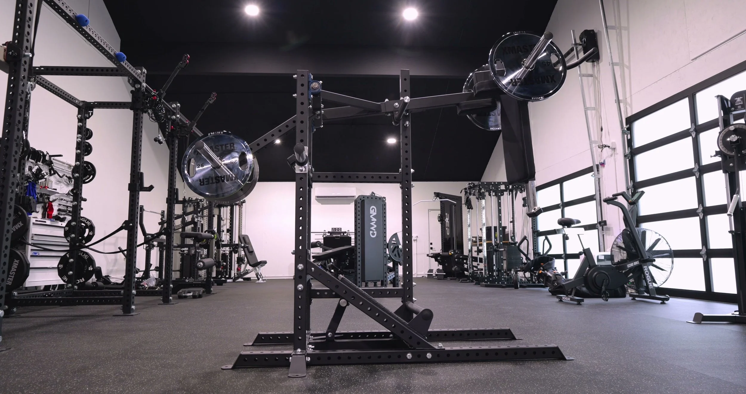 The Bells of Steel Pandemonium machine fully assembled in a home gym
