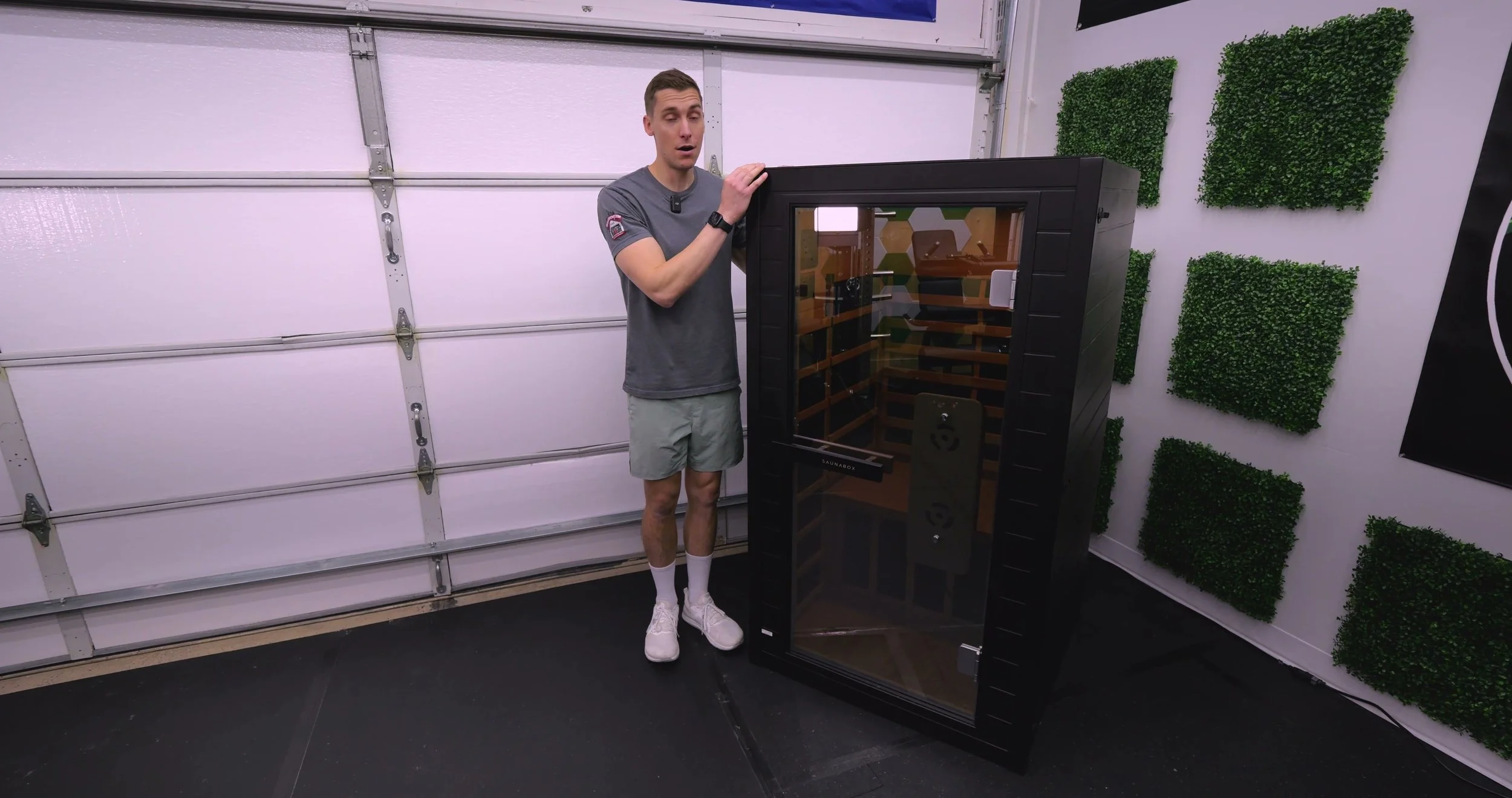 Michael standing next to Solara sauna showing height and door entry