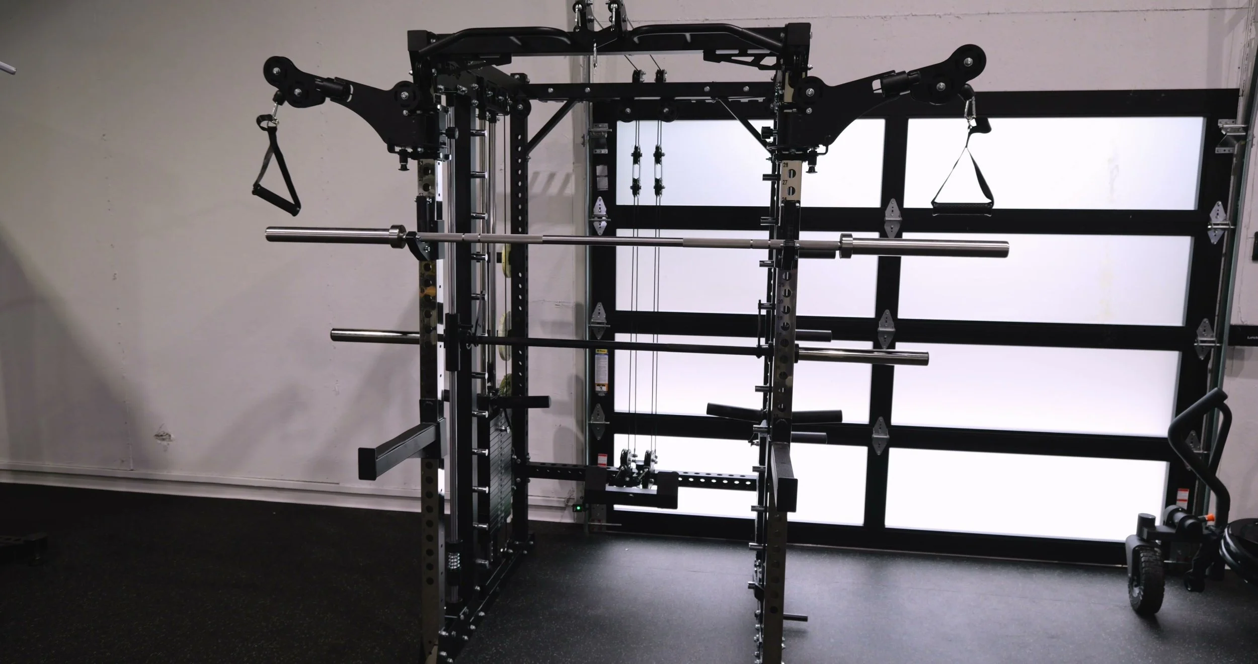 Landmark K2S Stealth all-in-one home gym assembled with dual cable stacks, Smith machine, and pivot arms
