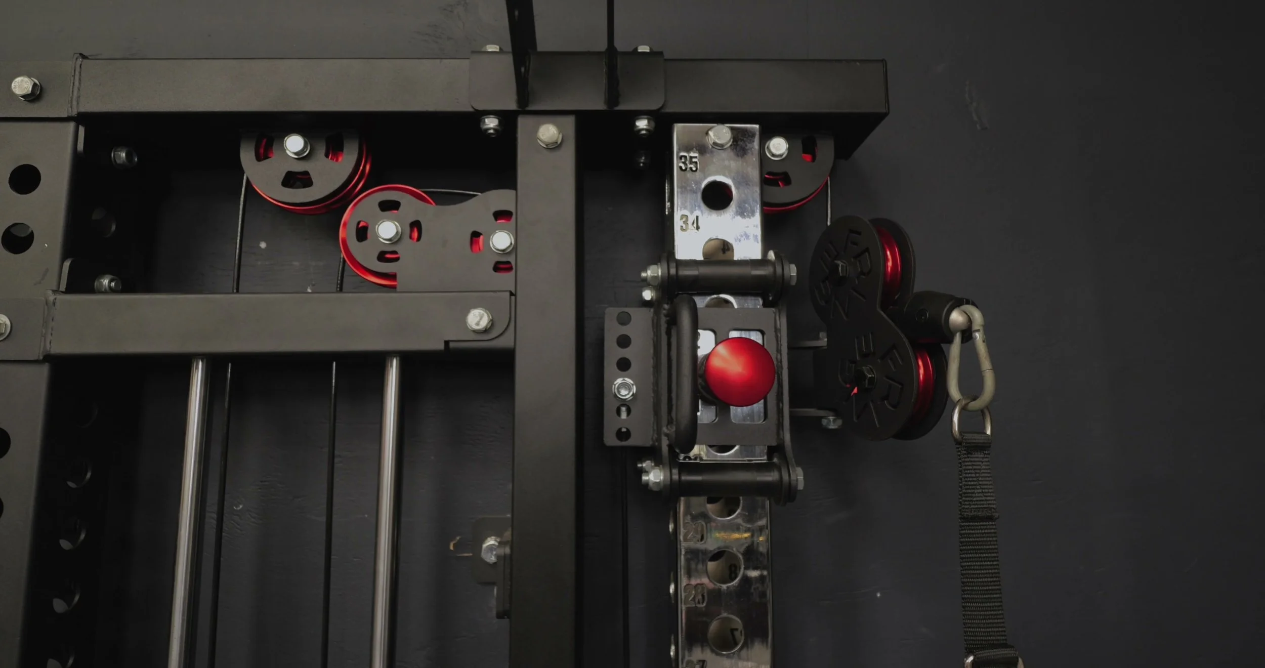 slim gym cable trolley adjustment with roller system close up