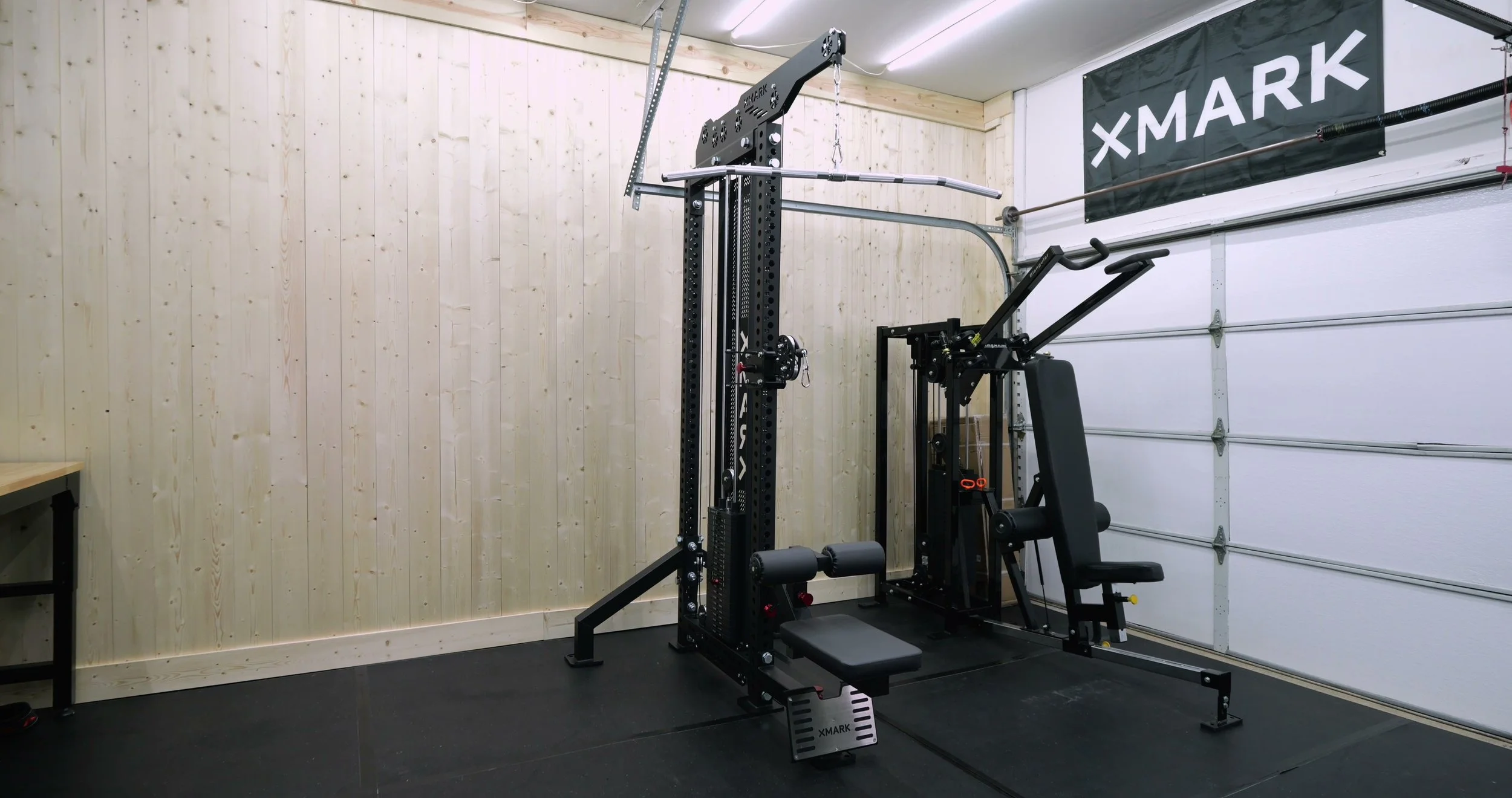 XMARK single-stack lat pulldown/low row machine in a home gym