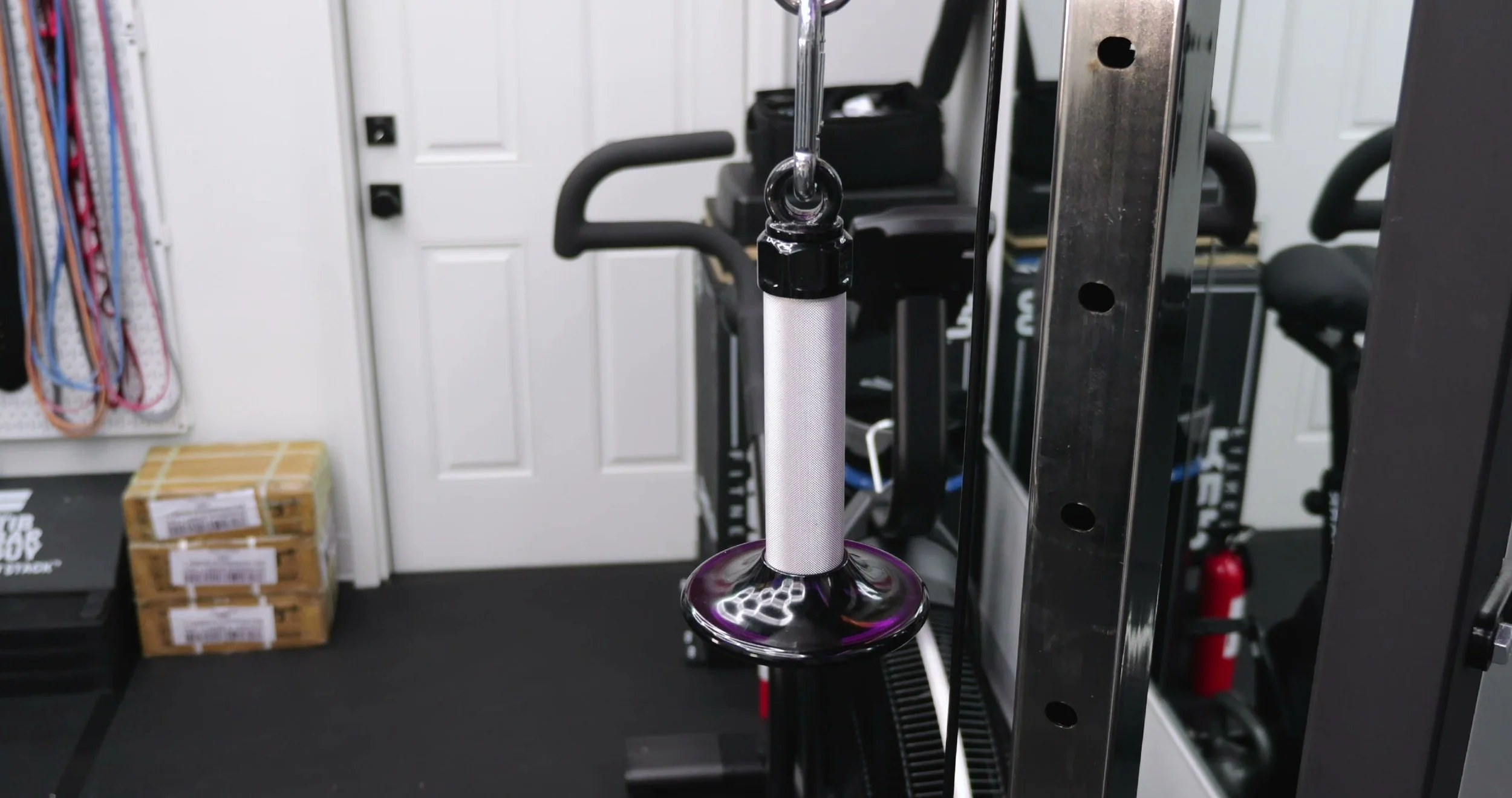 iso deadblow handle with wide ergonomic base attached to cable