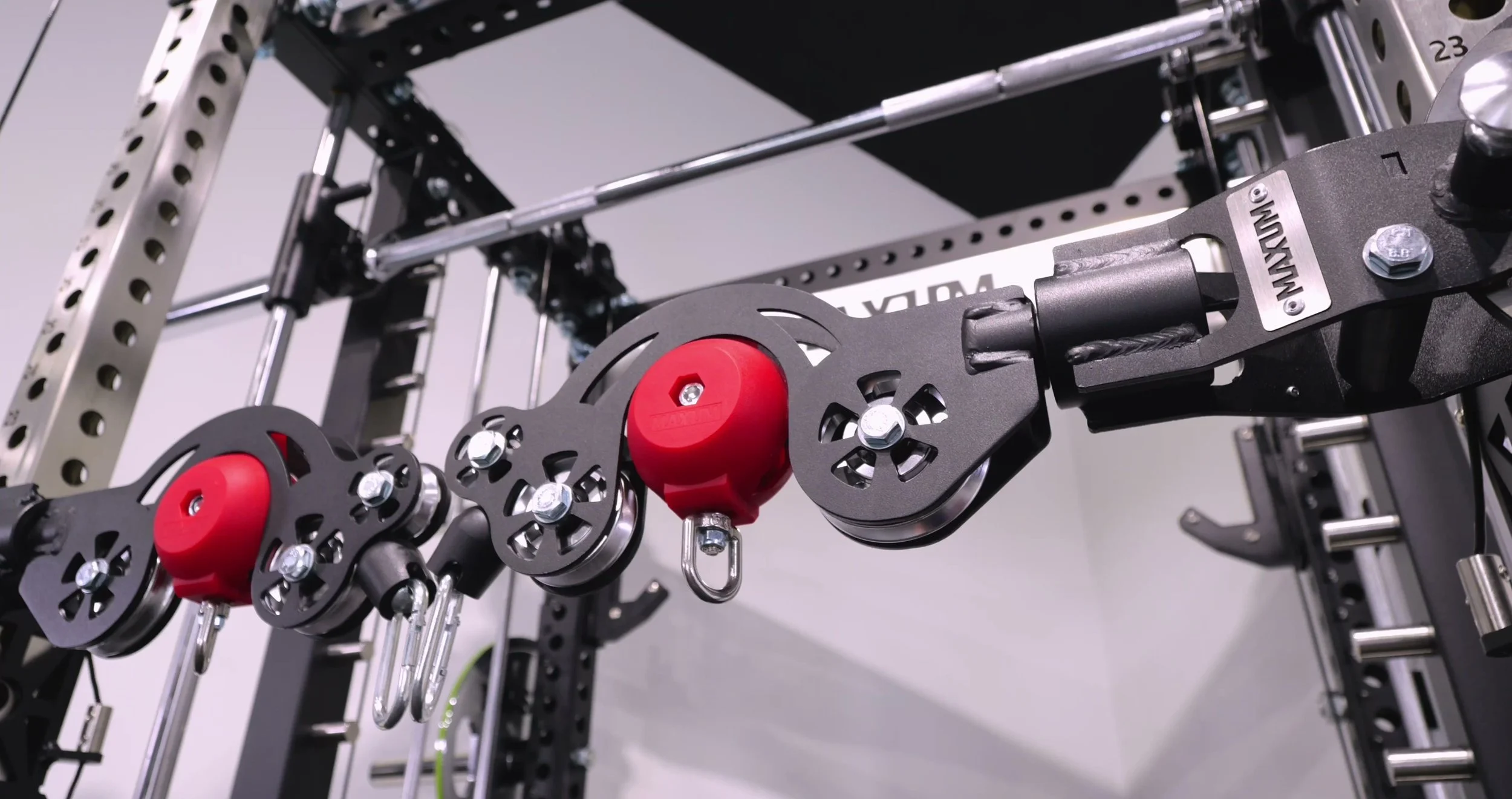 Close up of the red 1:1 ratio pulley on the MAXUM X3 mutant arms
