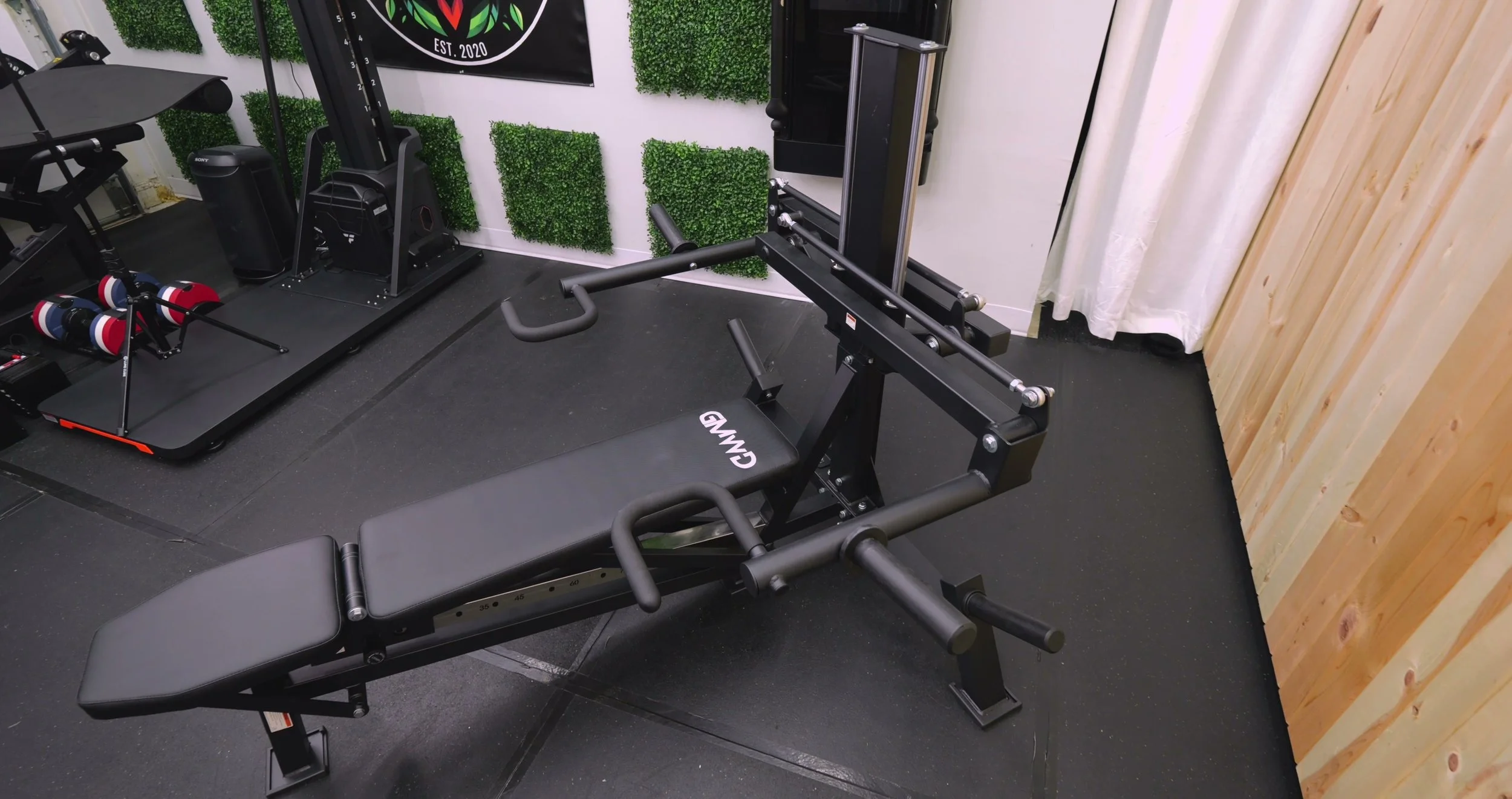 Close-up of the GMWD V7 frame showing bolt-together construction and gas-assist piston