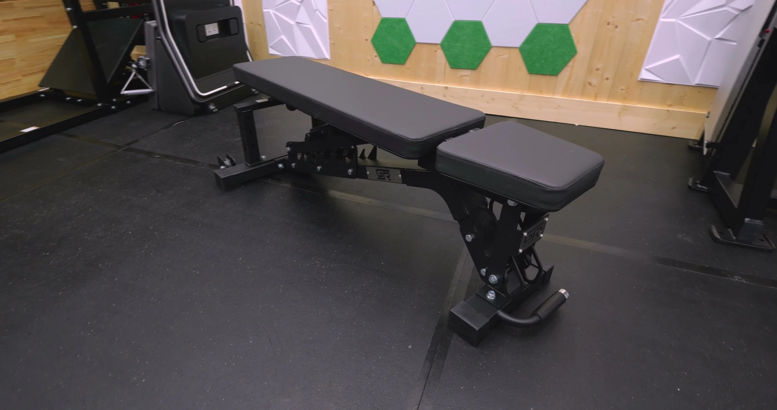 GetRX’d FID AB2 adjustable bench set up flat inside a home gym