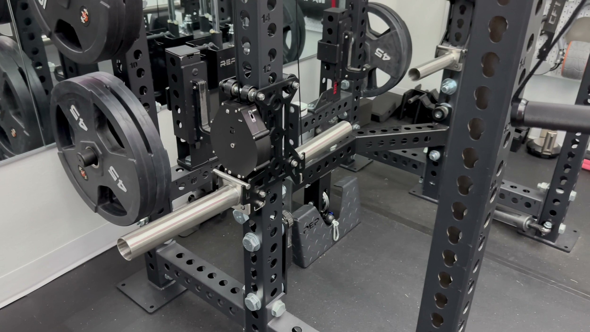 close up of ibex aluminum trolley with pom rollers and brushed hardware on rack upright