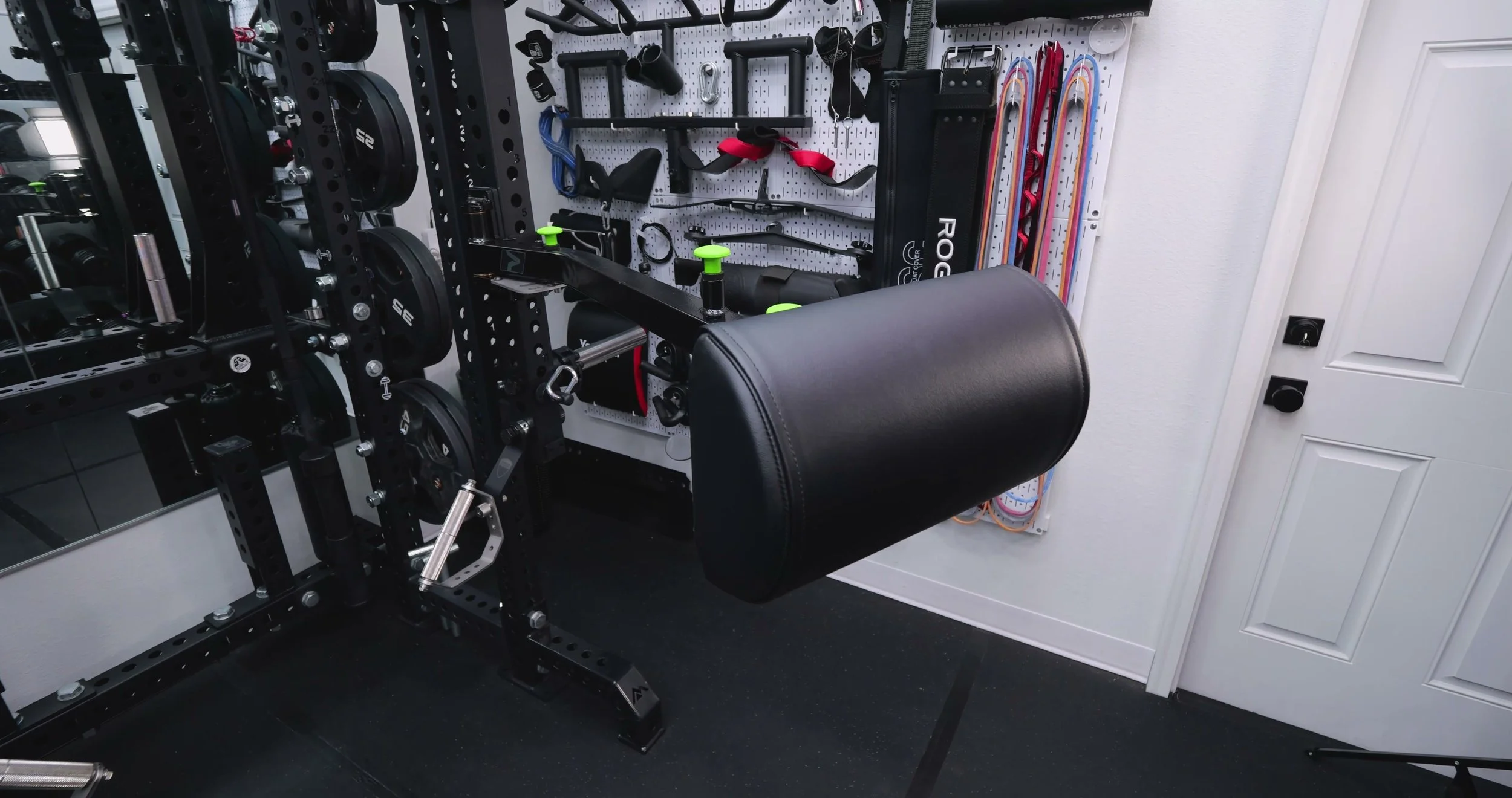 Prime Fitness Prodigy Adjustable Stability Pad mounted on 3x3 rack upright