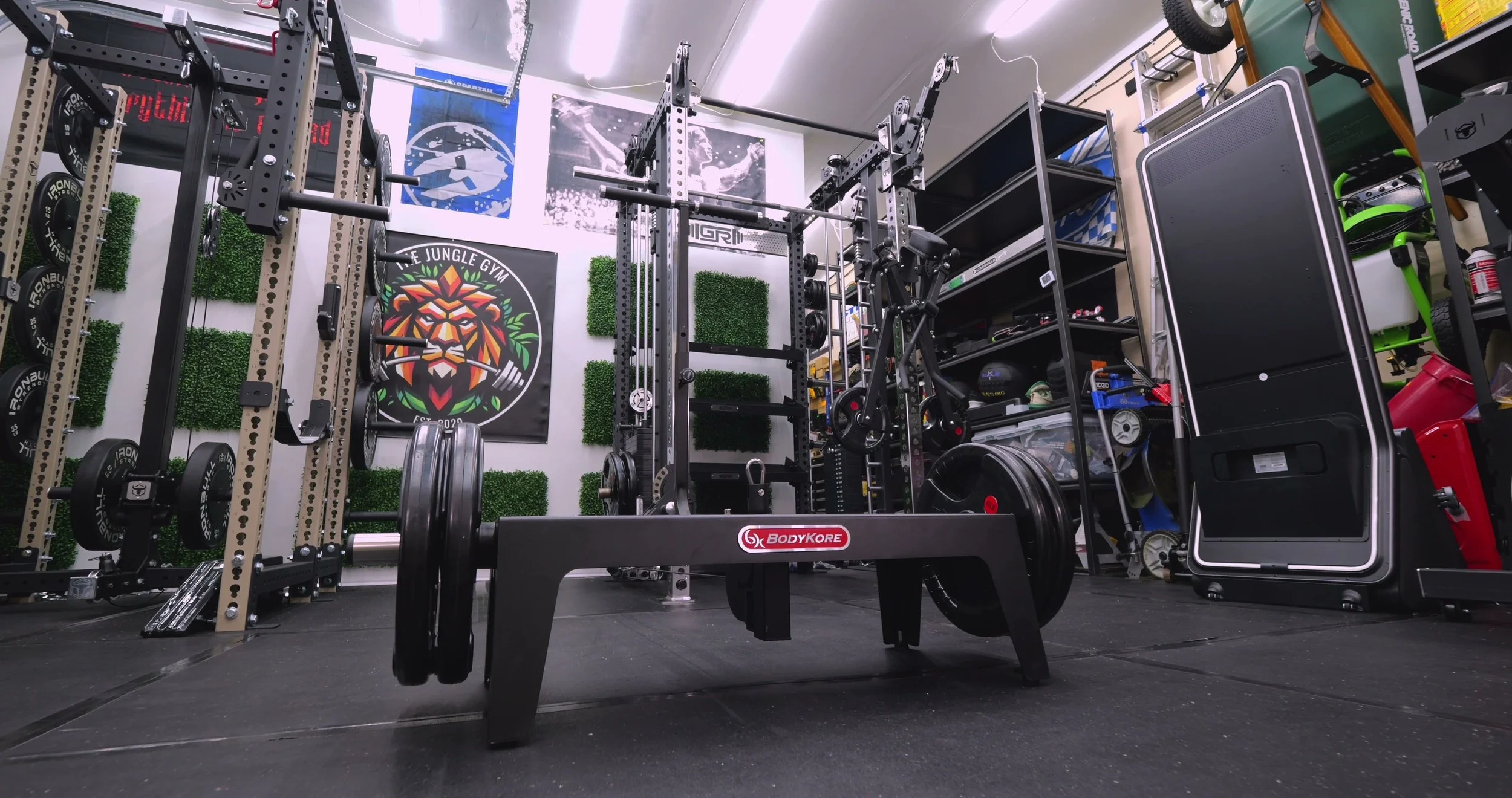 BodyKore Squat Box Pro connected to a cable machine for belt squats