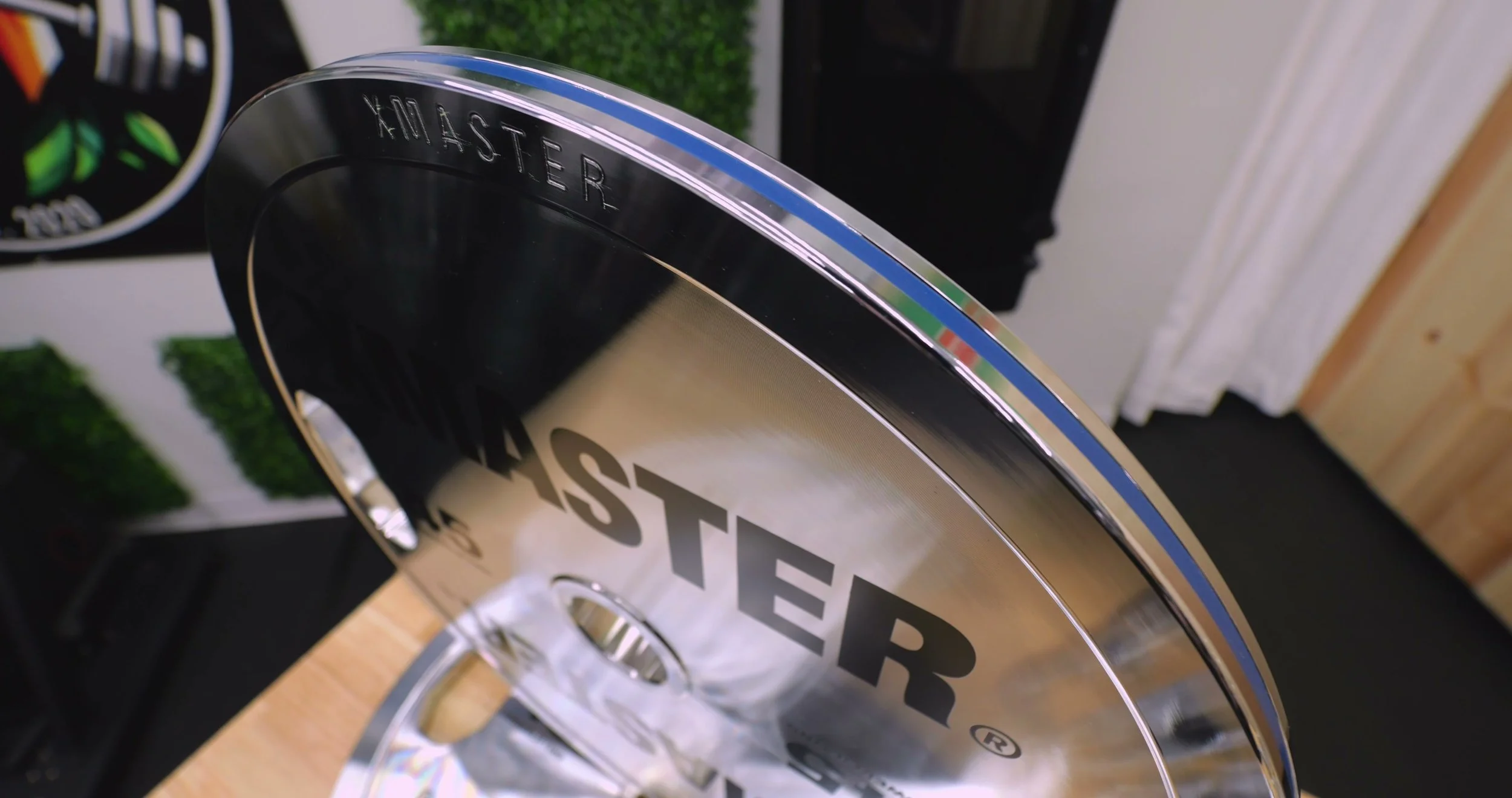 Measuring the thickness of the XMaster 45 lb chrome plate with calipers