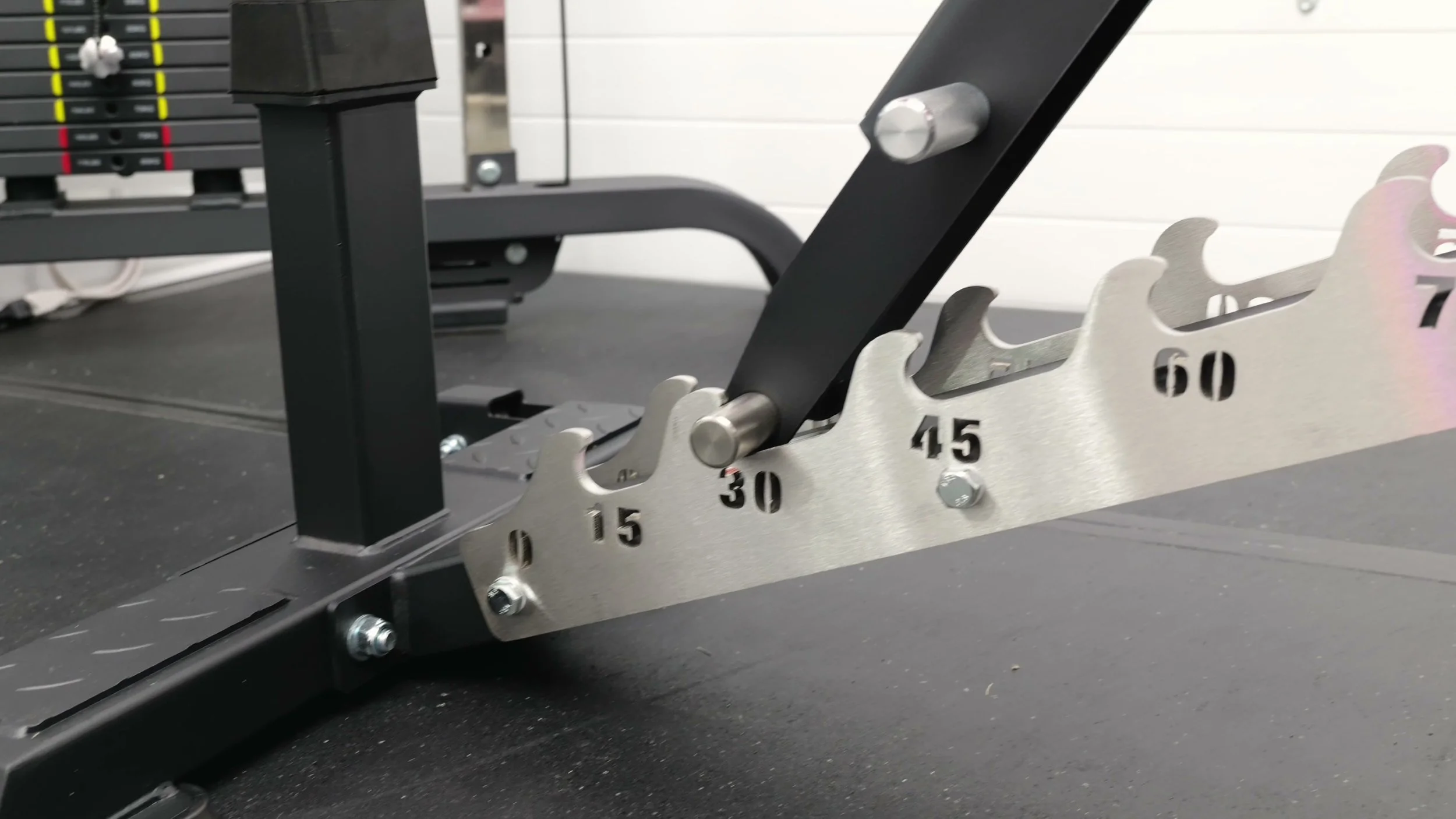 stainless ladder adjustment system with angle numbers and knurled knobs visible