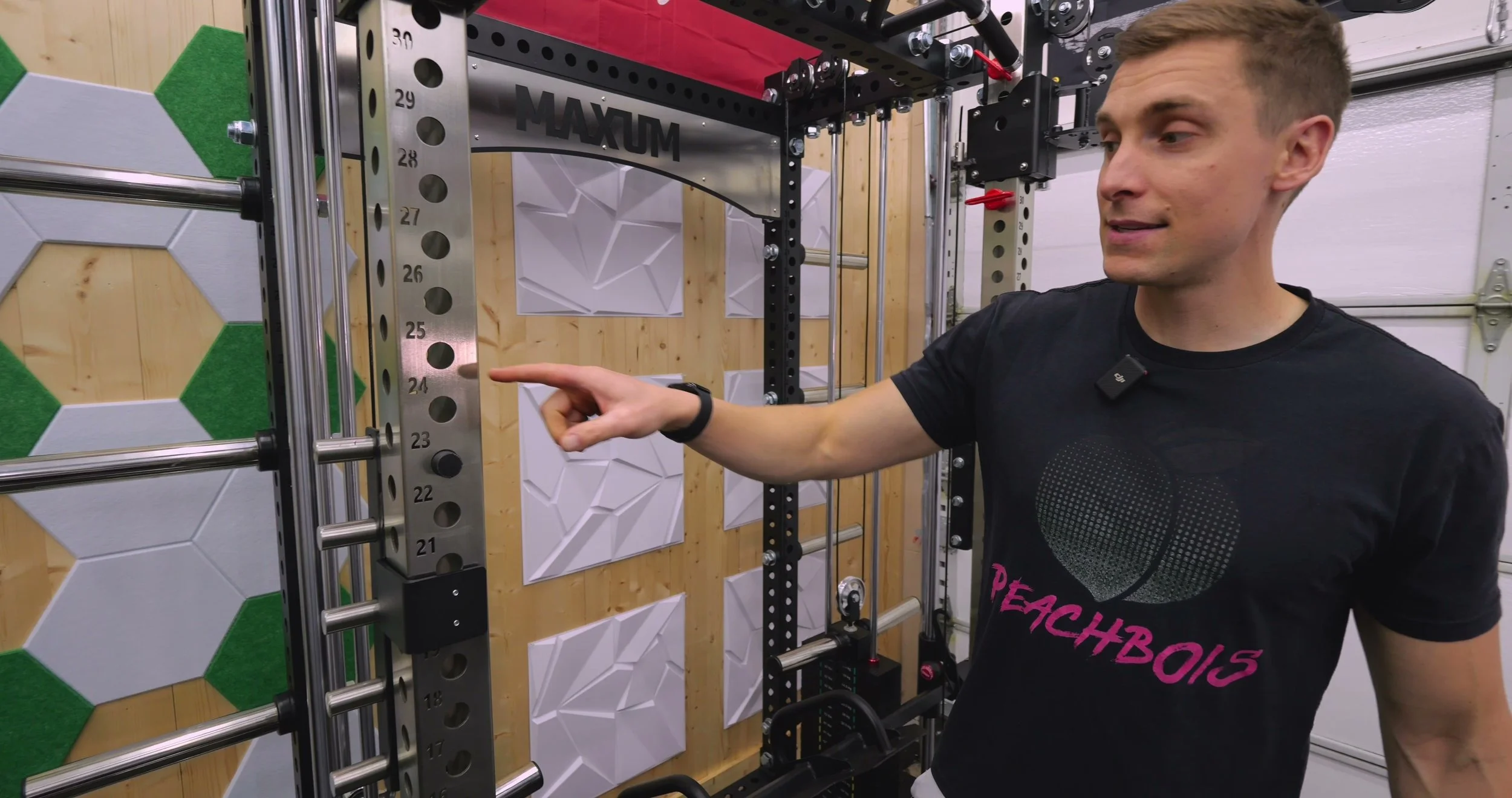 Close-up of 1-inch rack hole with pin fitment test on Maxum X1 upright