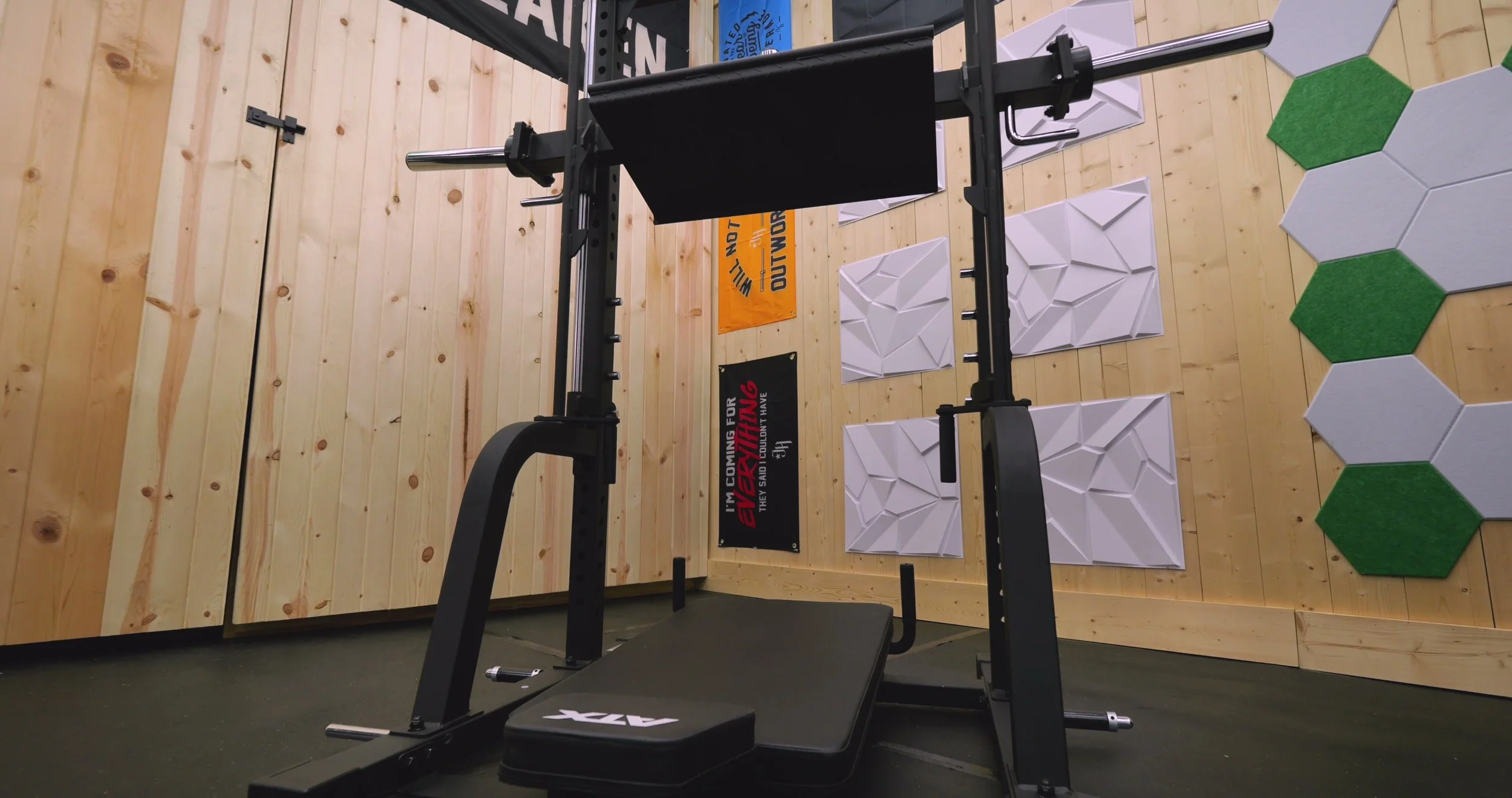 ATX vertical leg press foot plate showing heel lip design