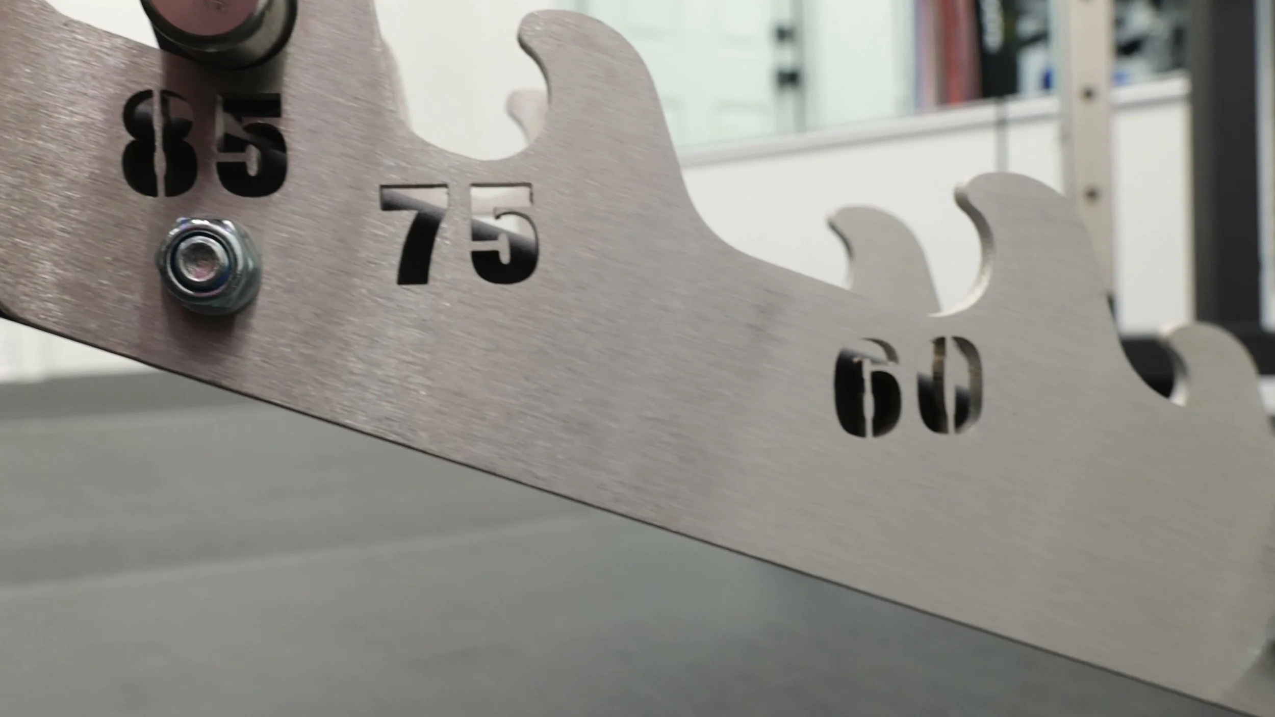 xmark black diamond bench set at incline angle showing compact base and wide stance