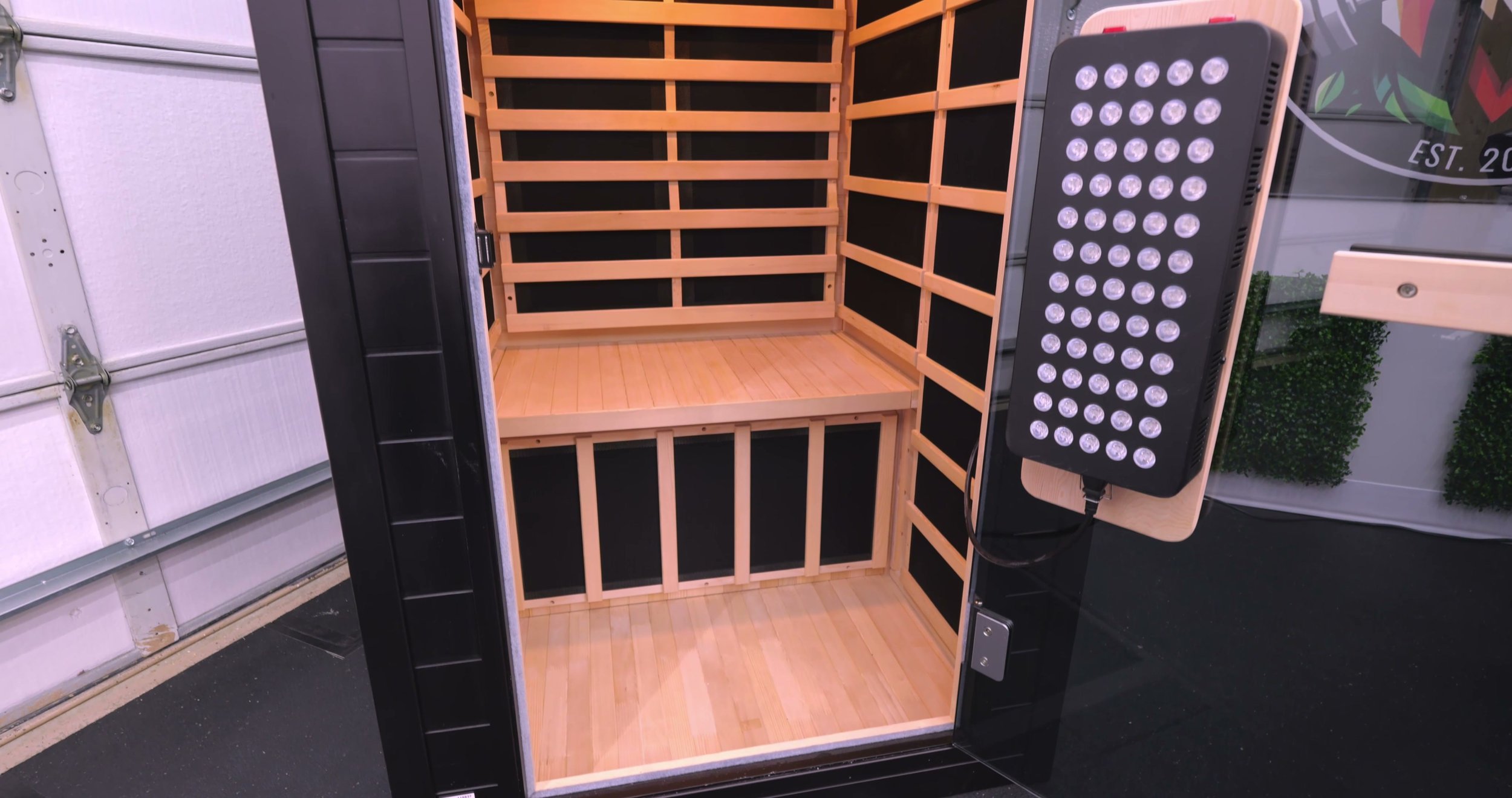 Close-up of Solara sauna door hinge, handle, and magnetic closure